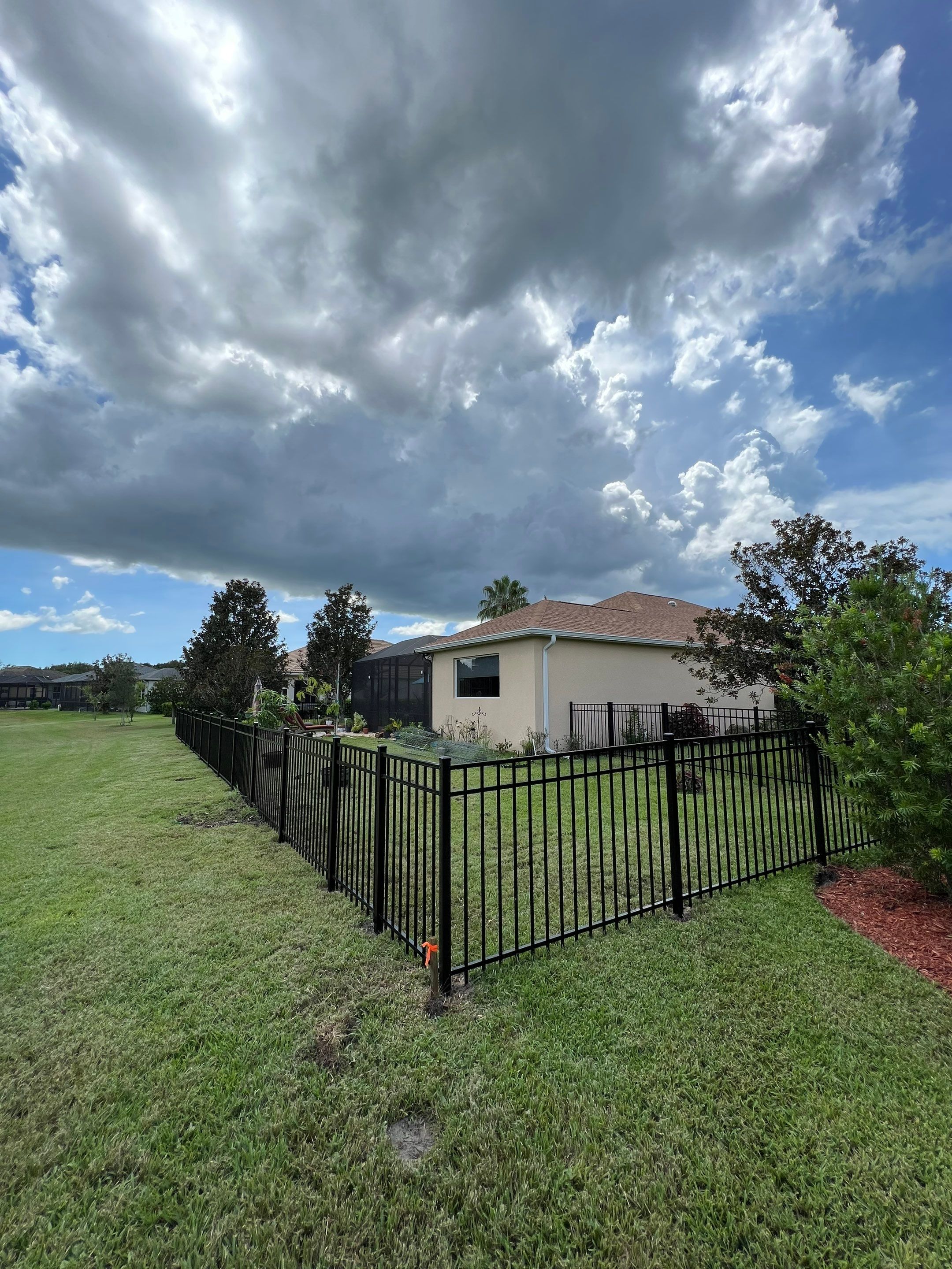 Black Aluminum Fence Installation in Bradenton, FL by Asap fence and gates, LLC