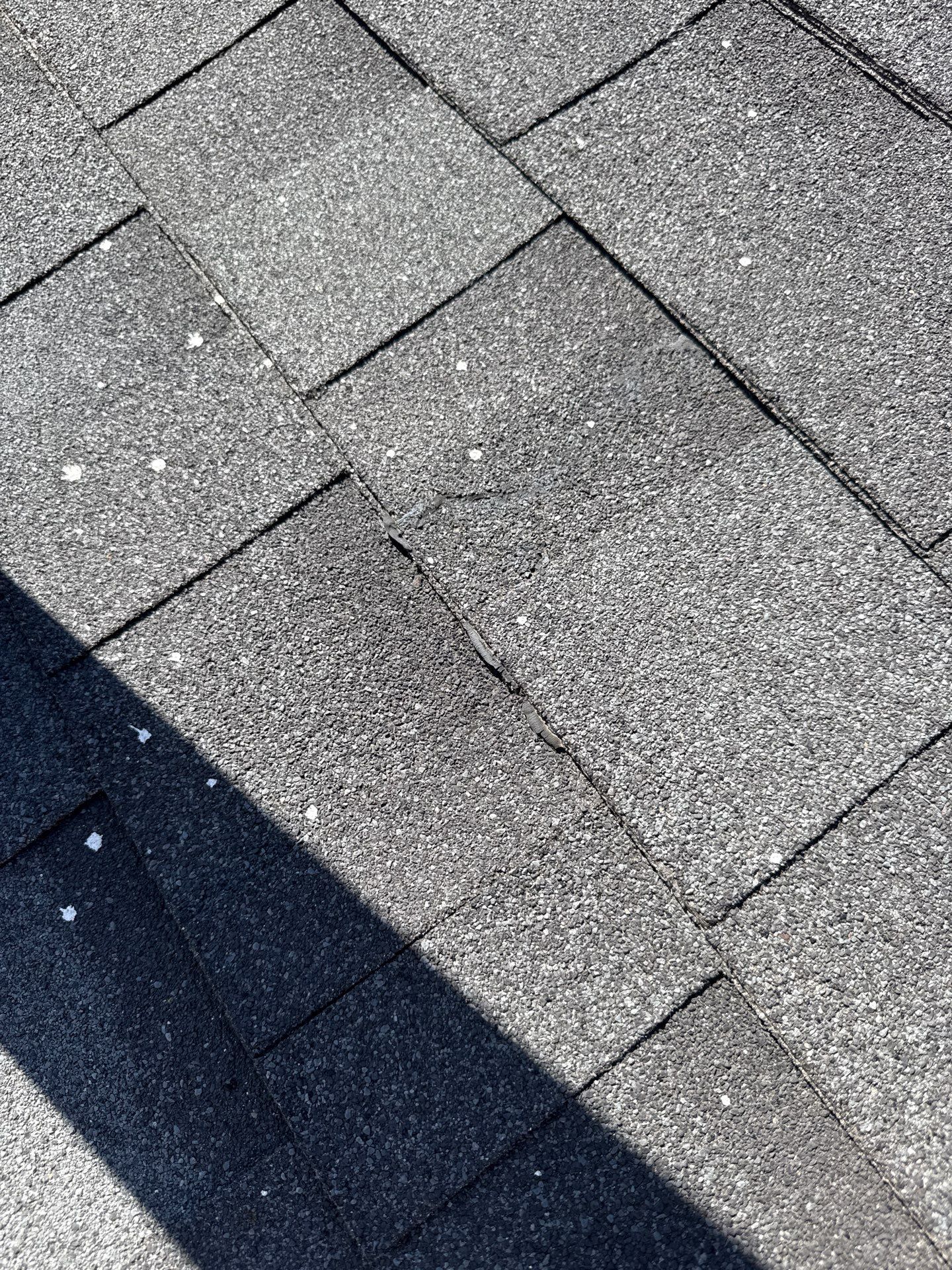 Residential Roof Replacement using TAMKO -  Stormfighter IR - Rustic Black by Action Exteriors Austin