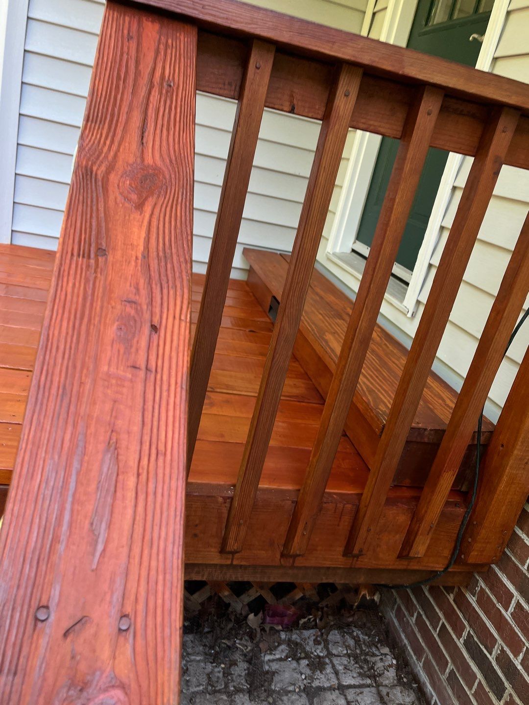 Triple deck re-staining by AKK Painting LLC