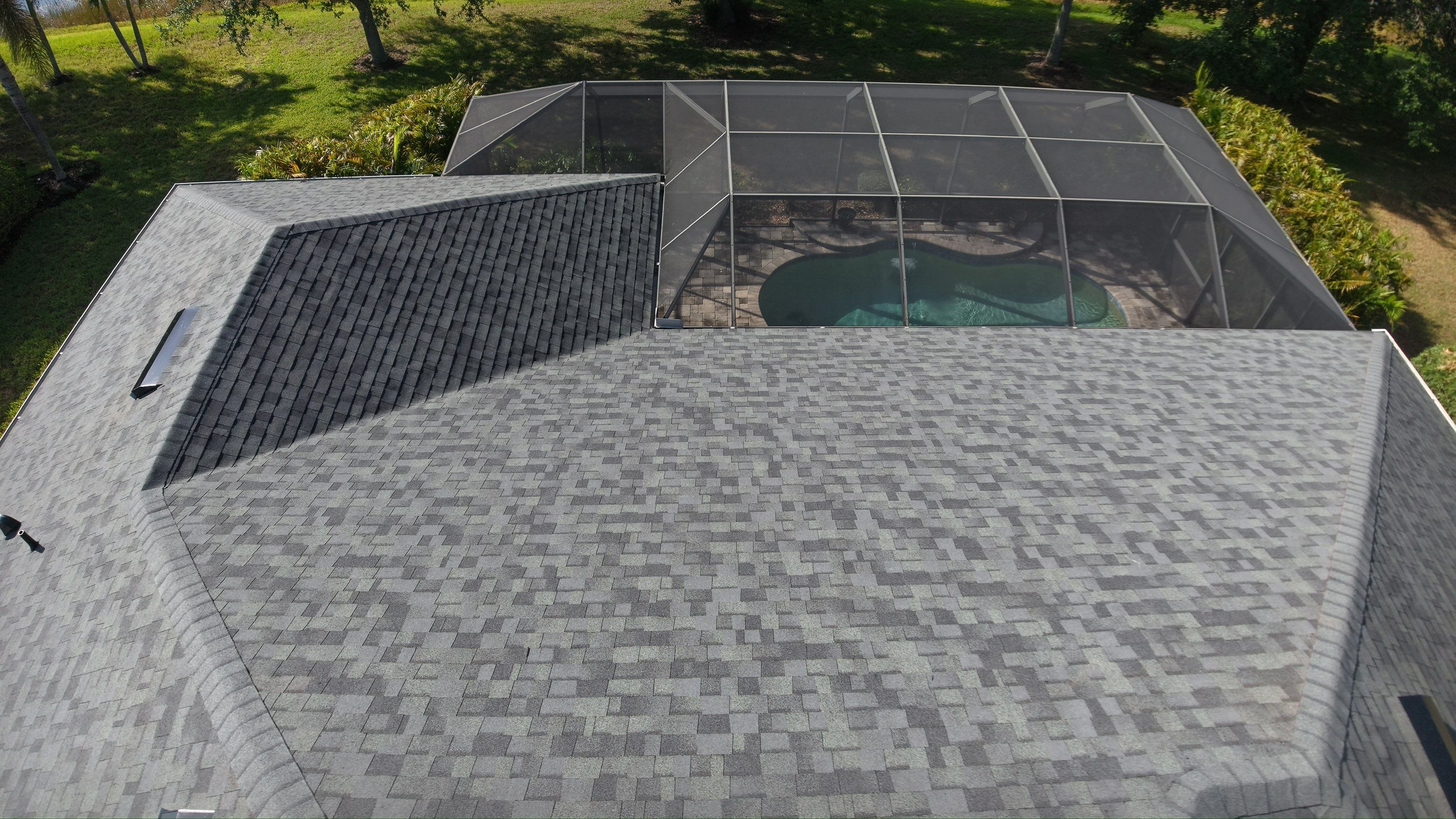 Residential Roof Installation With Estate Grey Architectural Shingles in Bradenton by Trinity Restoration and Roofing LLC
