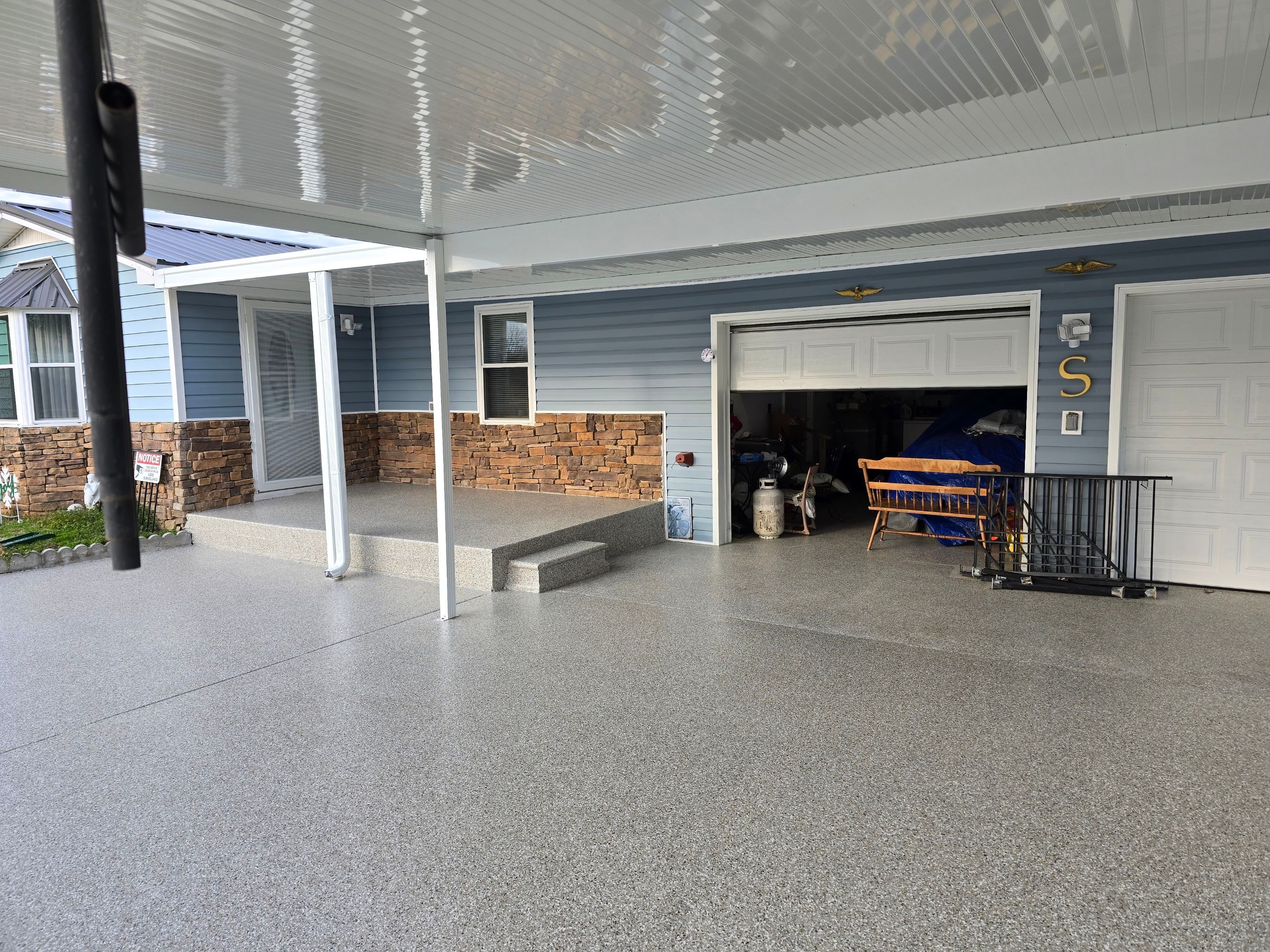 Garage & Patio Transformation Using Creekbed by Elite Floor Solutions