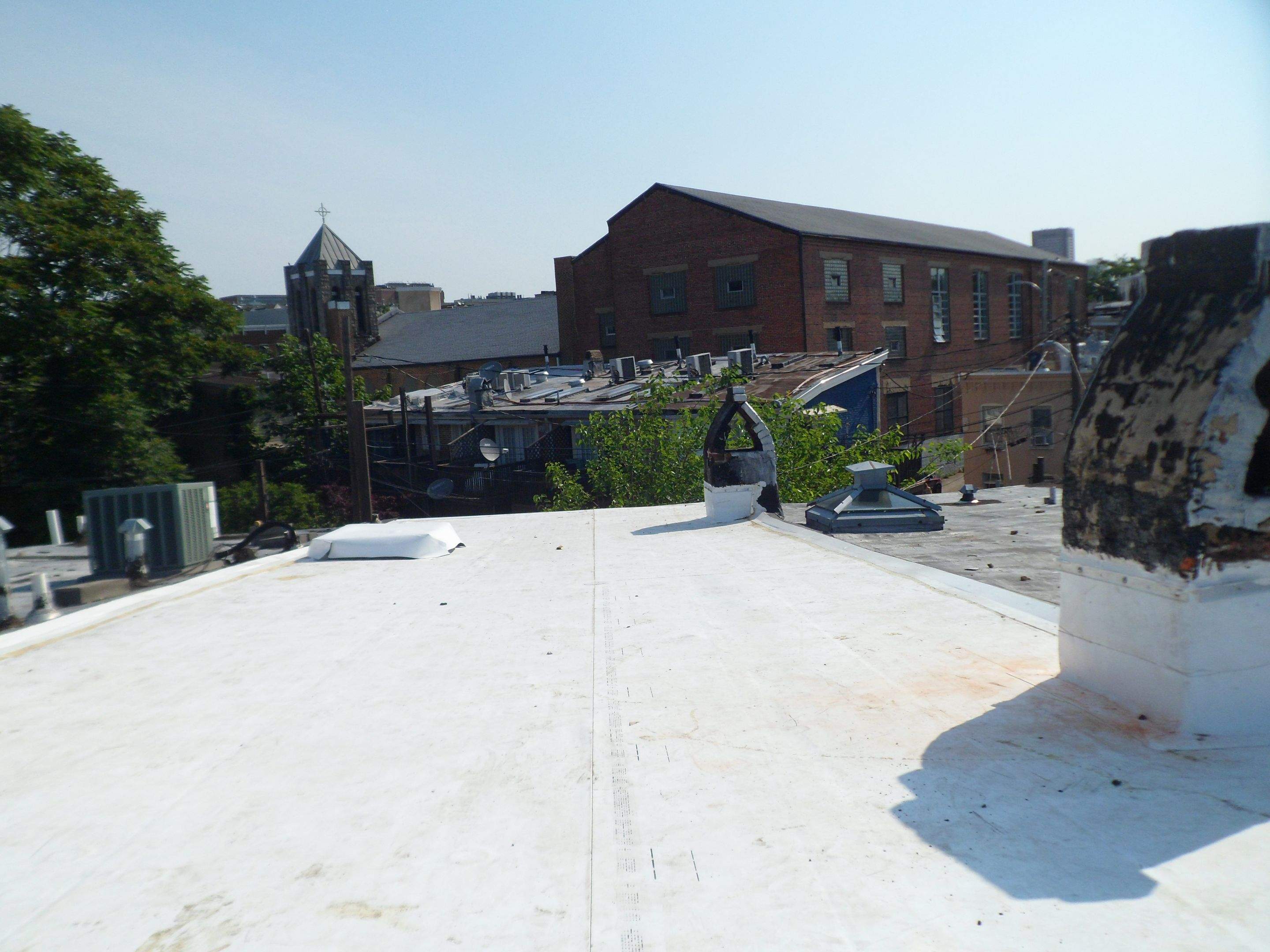 Commercial Roofing Installation using TPO by Alpha Design Services