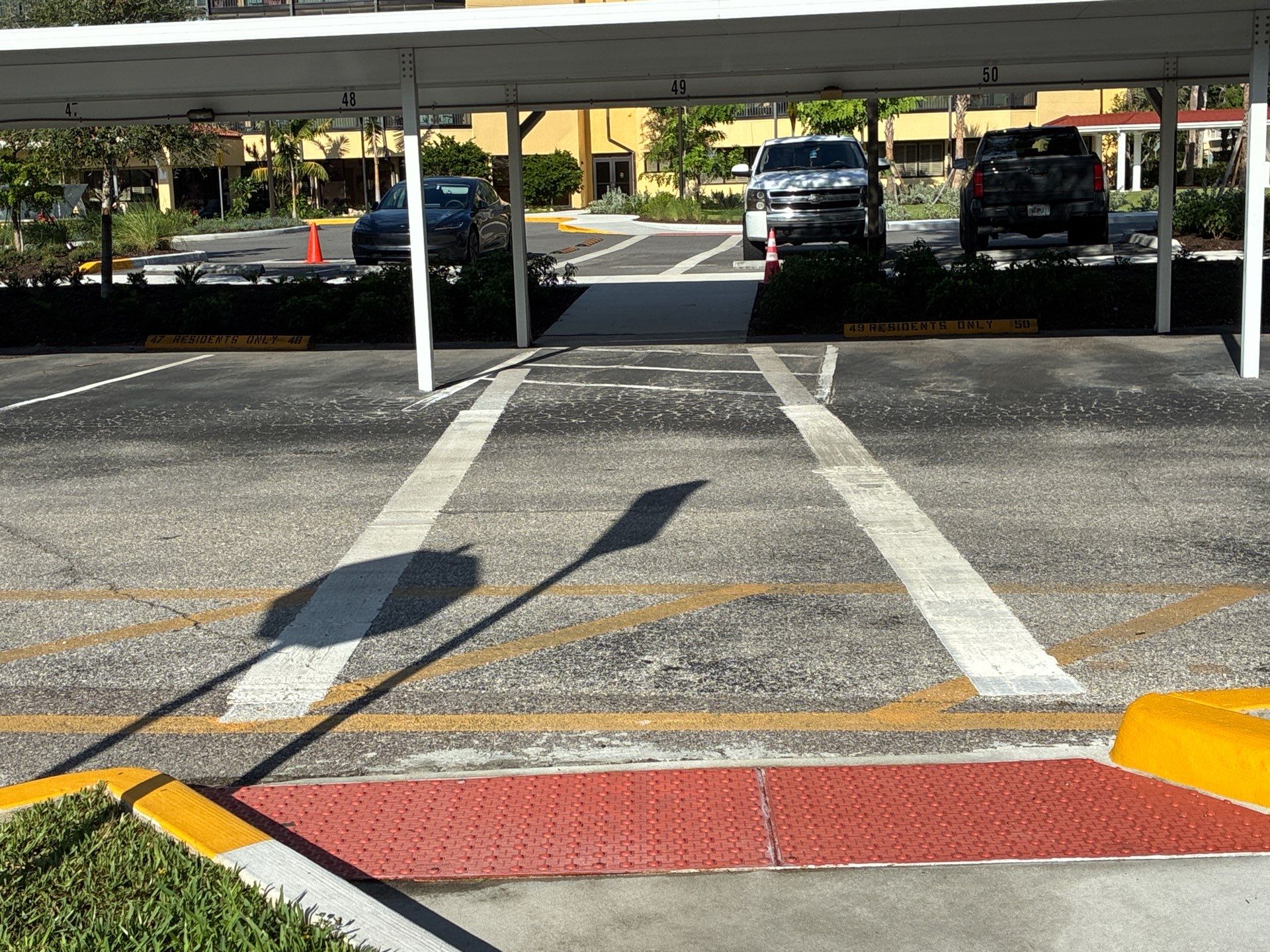 Comprehensive Parking Lot Mill and Overlay with Custom Line Striping in Venice by Everline Coatings & Services - Southwest FL