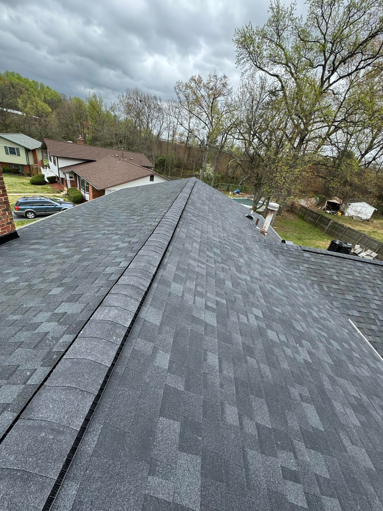 Estate Gray Shingles by Reimagine Roofing