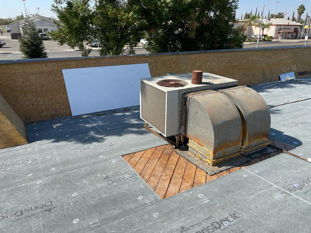 Commercial Roofing Installation using General Coatings acrylic coatings and spray foam by Straight Edge Roofing Inc