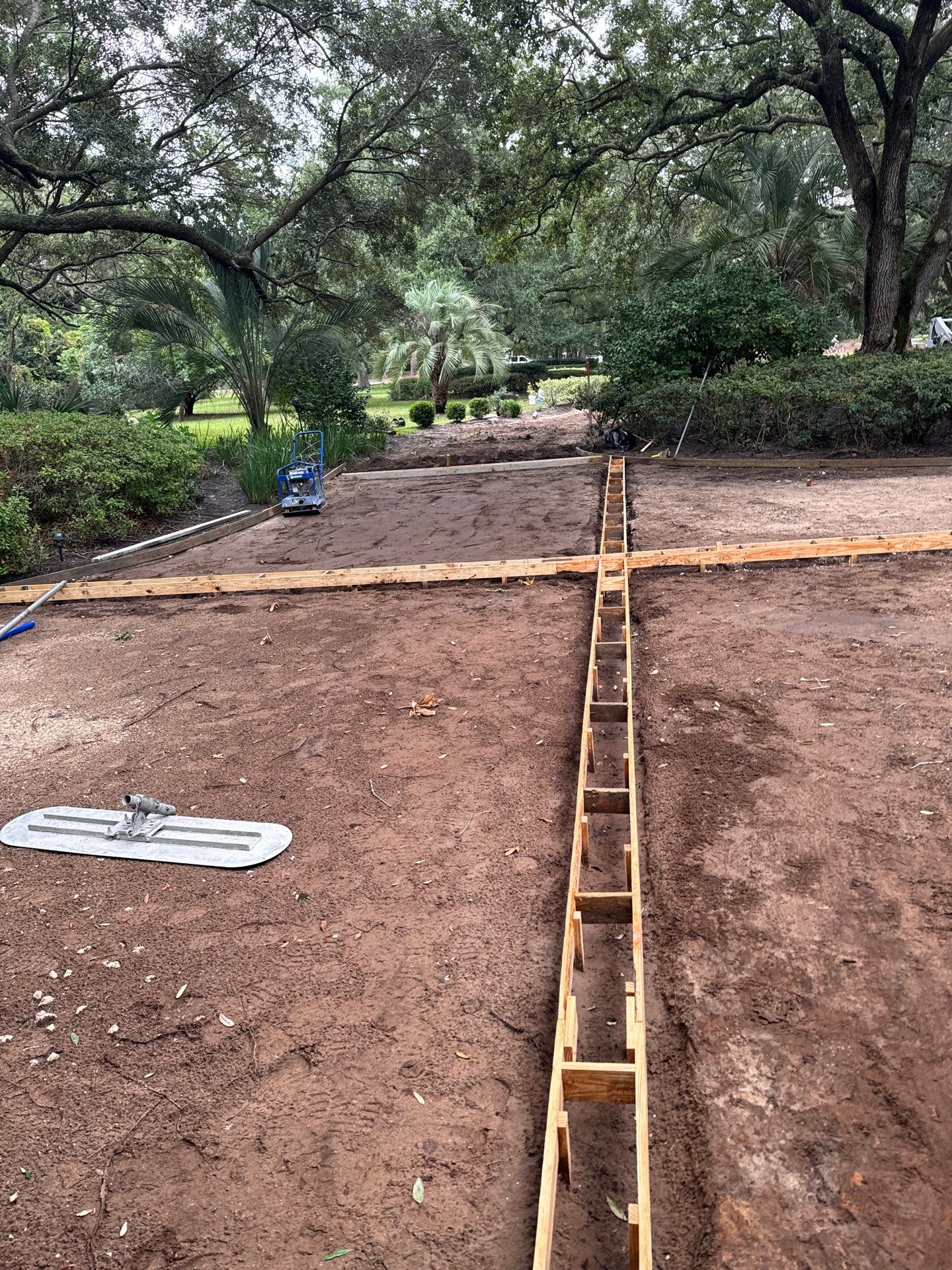 Custom Concrete Driveway with Decorative Paver Inlays in Hilton Head Island by Lowcountry Scapes, LLC