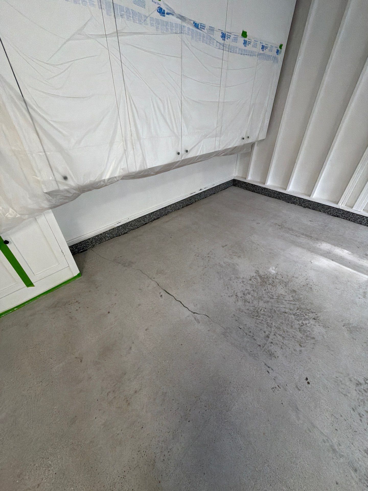 Pentwater Garage Epoxy Flake Floor Installation and Exterior Refinement by Gordon Painting
