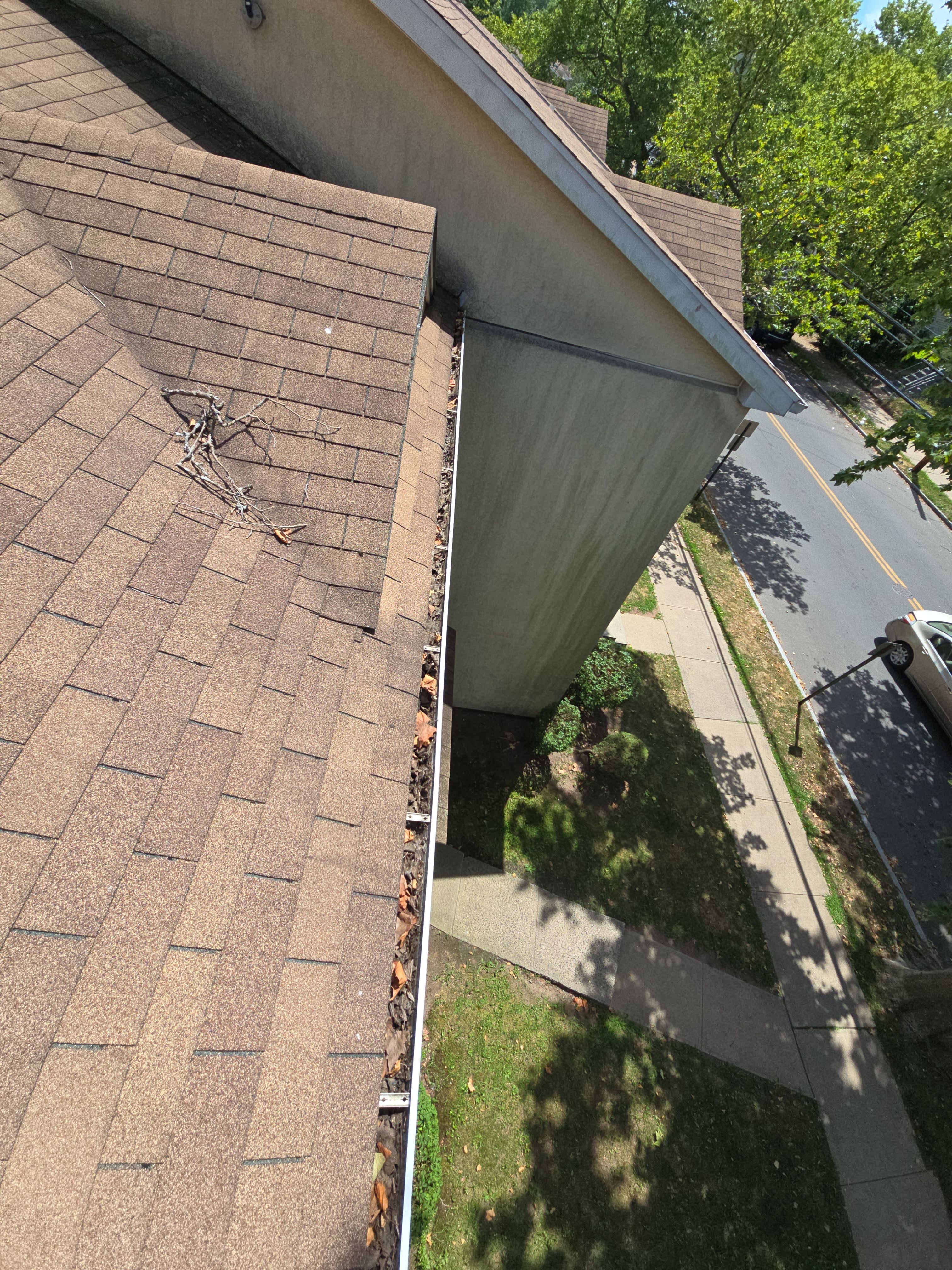Commercial gutter cleaning Bridgeport before photo with filled gutters