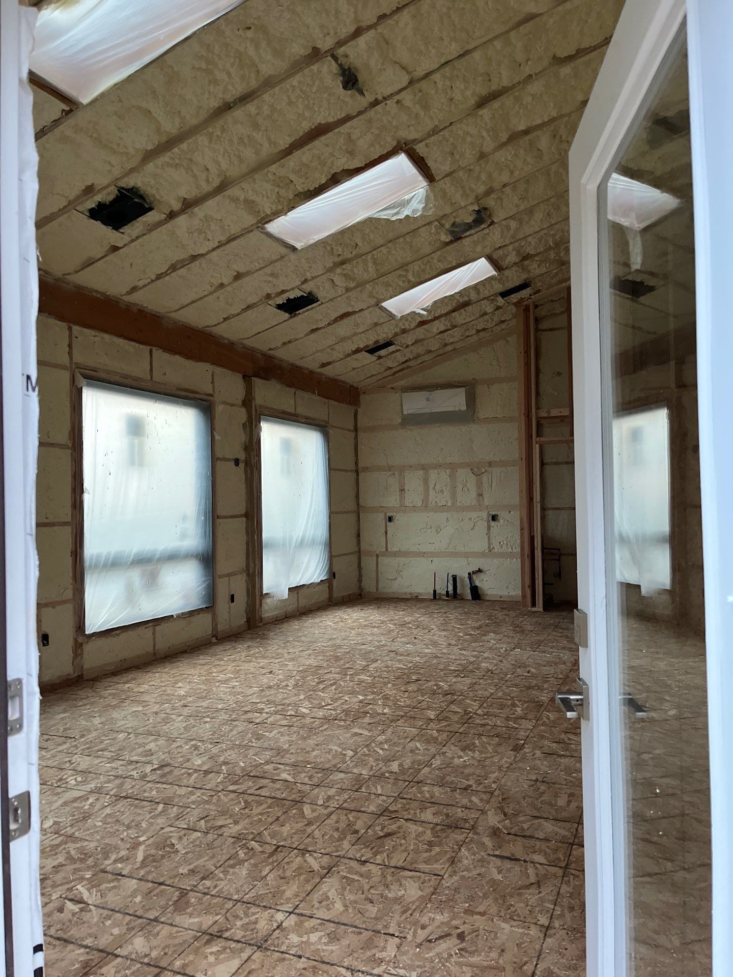 Open Cell Spray Foam to a Pole Barn by NYS Foam & Energy