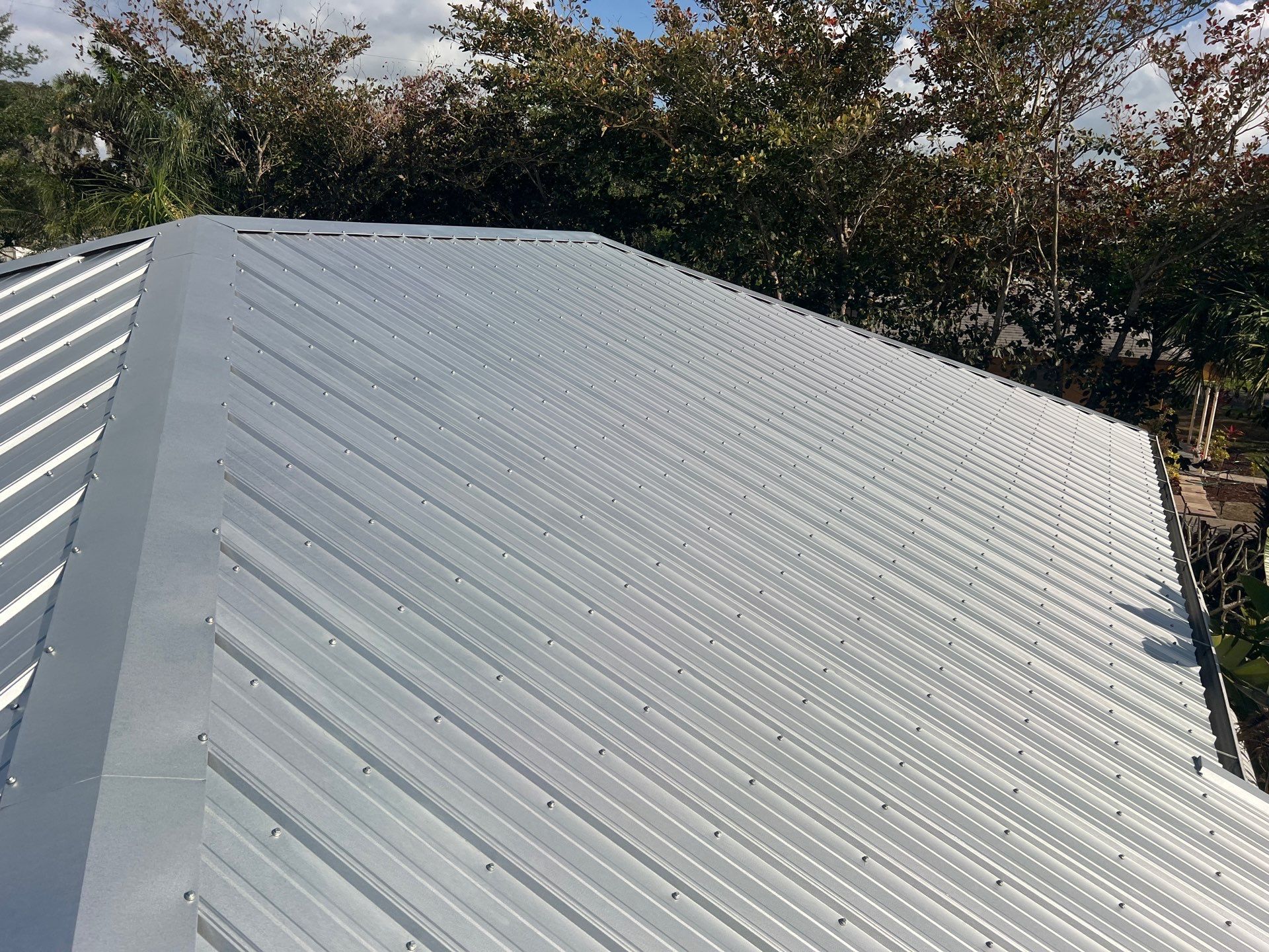 Residential Roofing Installation using Durabull Classic Rib Panel by Durabilis Roofing INC