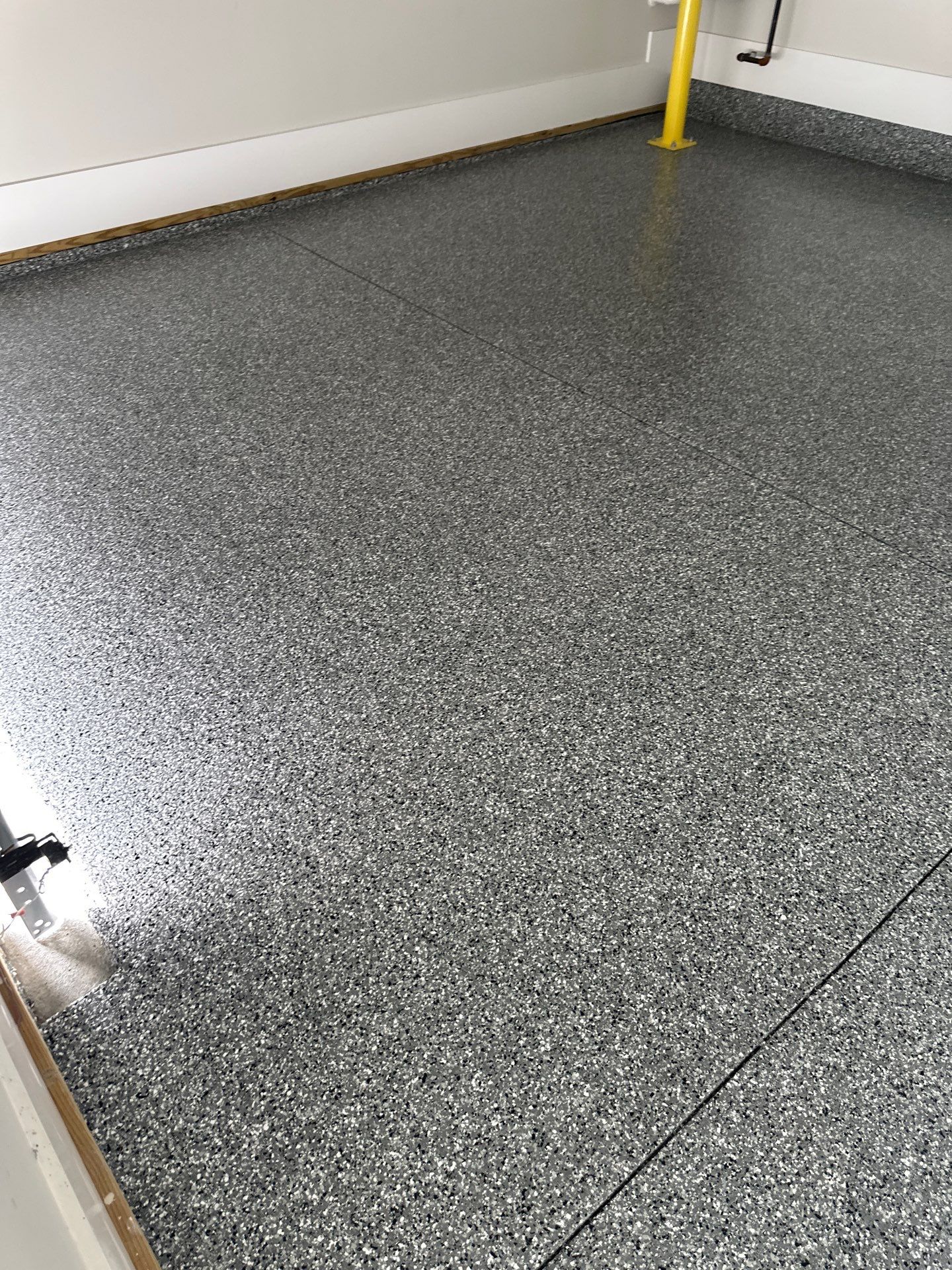 Garage Floor Coating using Wombat by My Garage Floor Guys