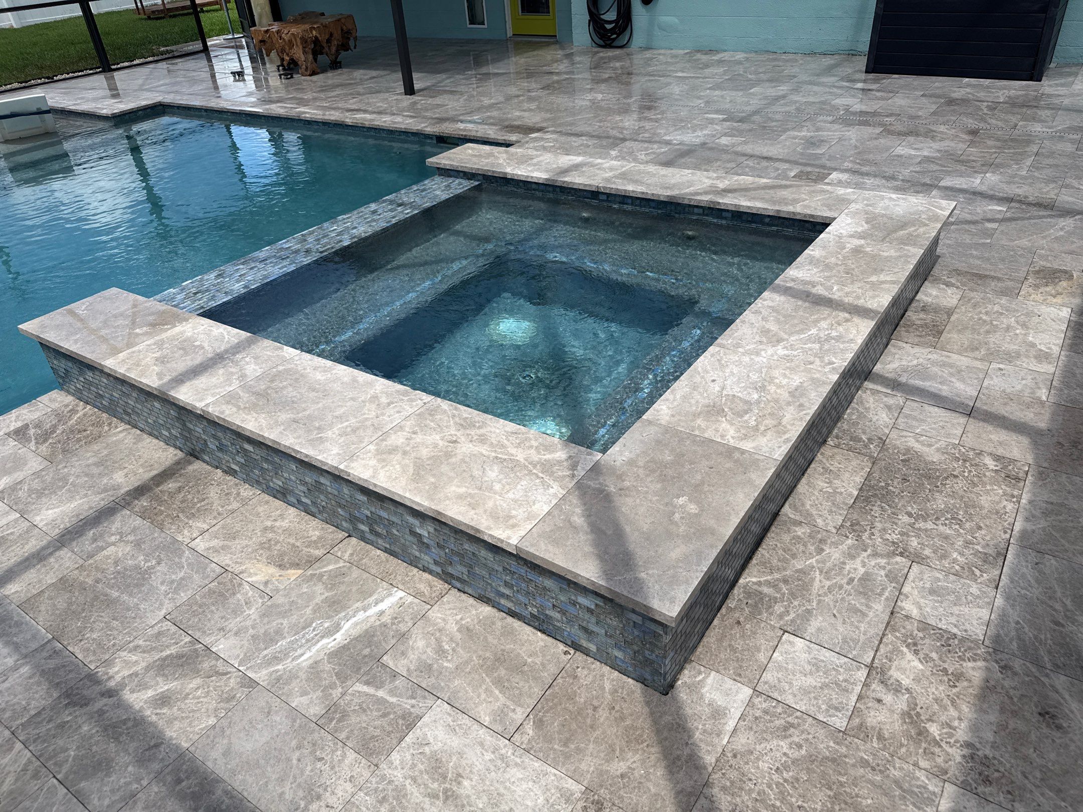 Travertine Pool Deck, Lanai & Screen Enclosure Cleaning Near Manatee River | Bradenton, FL by Sunshine AquaWash