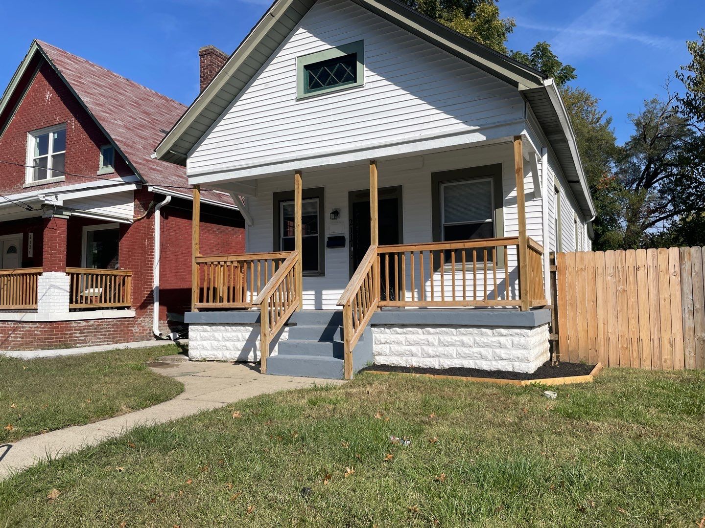 Rental Property Restoration, siding, flooring, gutters, landscaping by Storm Contracting 