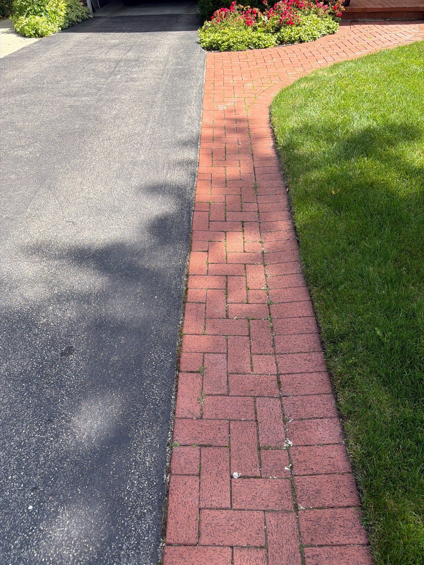 Brick Paver cleaning, sanding, seal by Northern Power Washing LLC.
