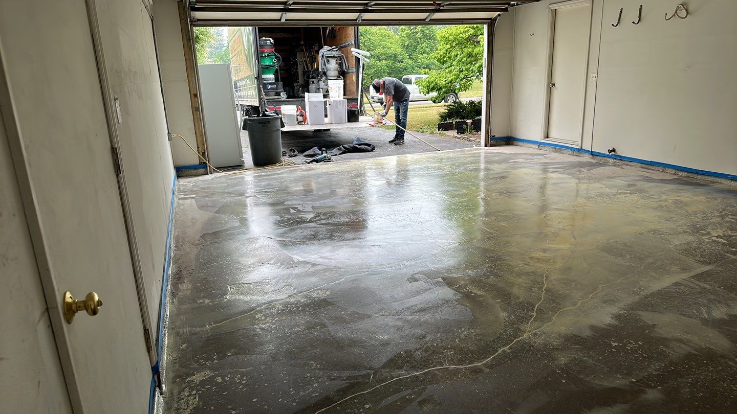 Silverado garage floor coating  by NG Masonry & Construction LLC