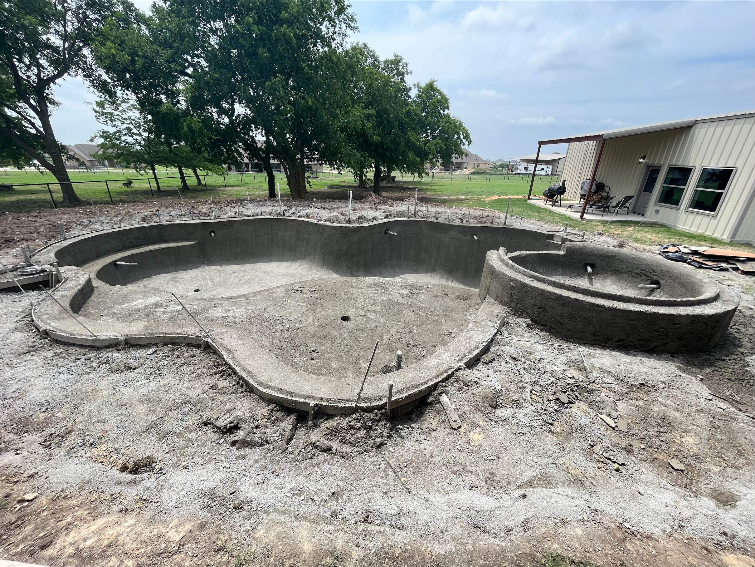 Freeform Pool with Raised Spa and Tanning Ledge by Pinnacle Pools and Spas - DFW