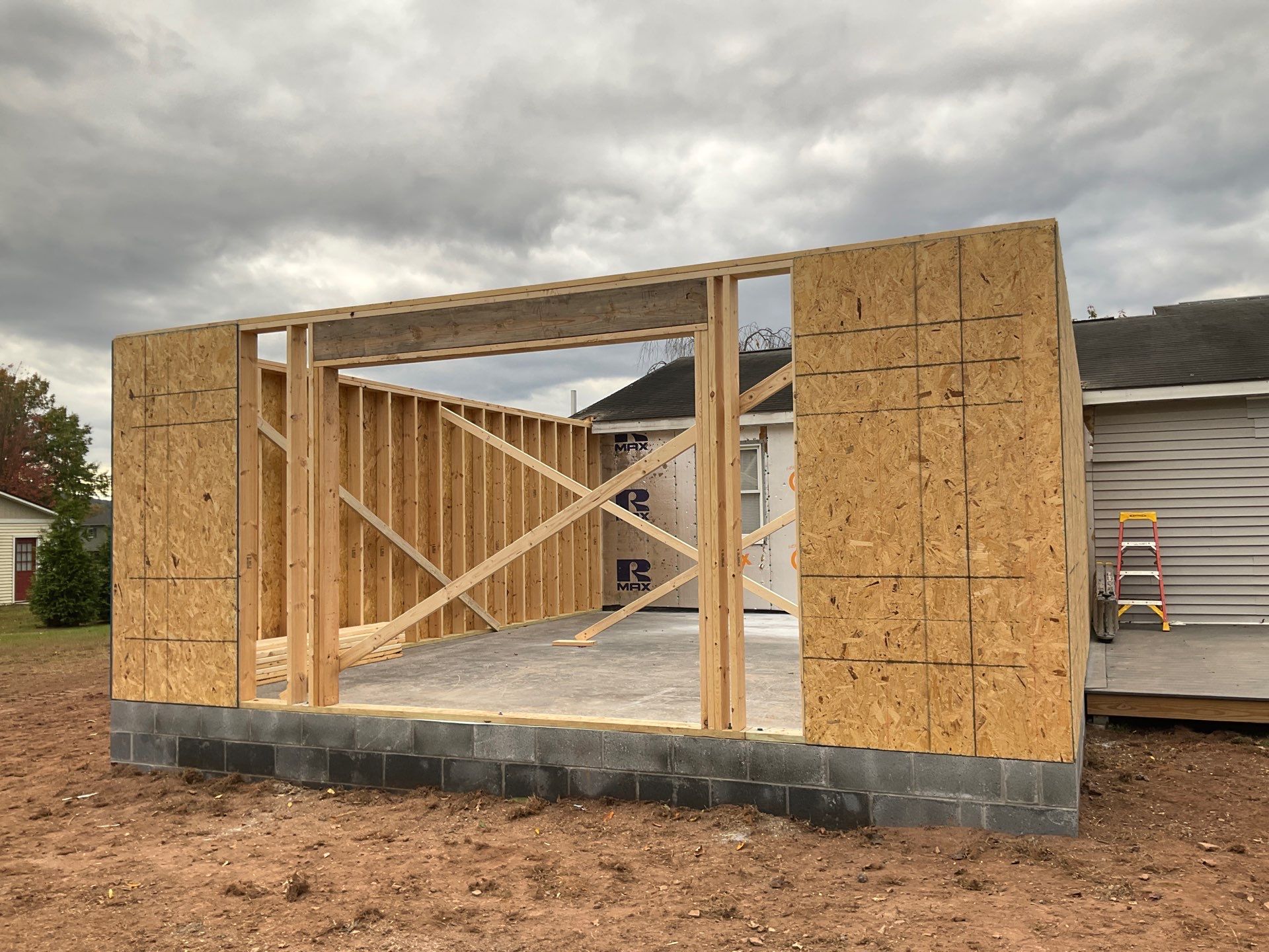 Residential Addition and Covered Porch Roof  by Esh Builders