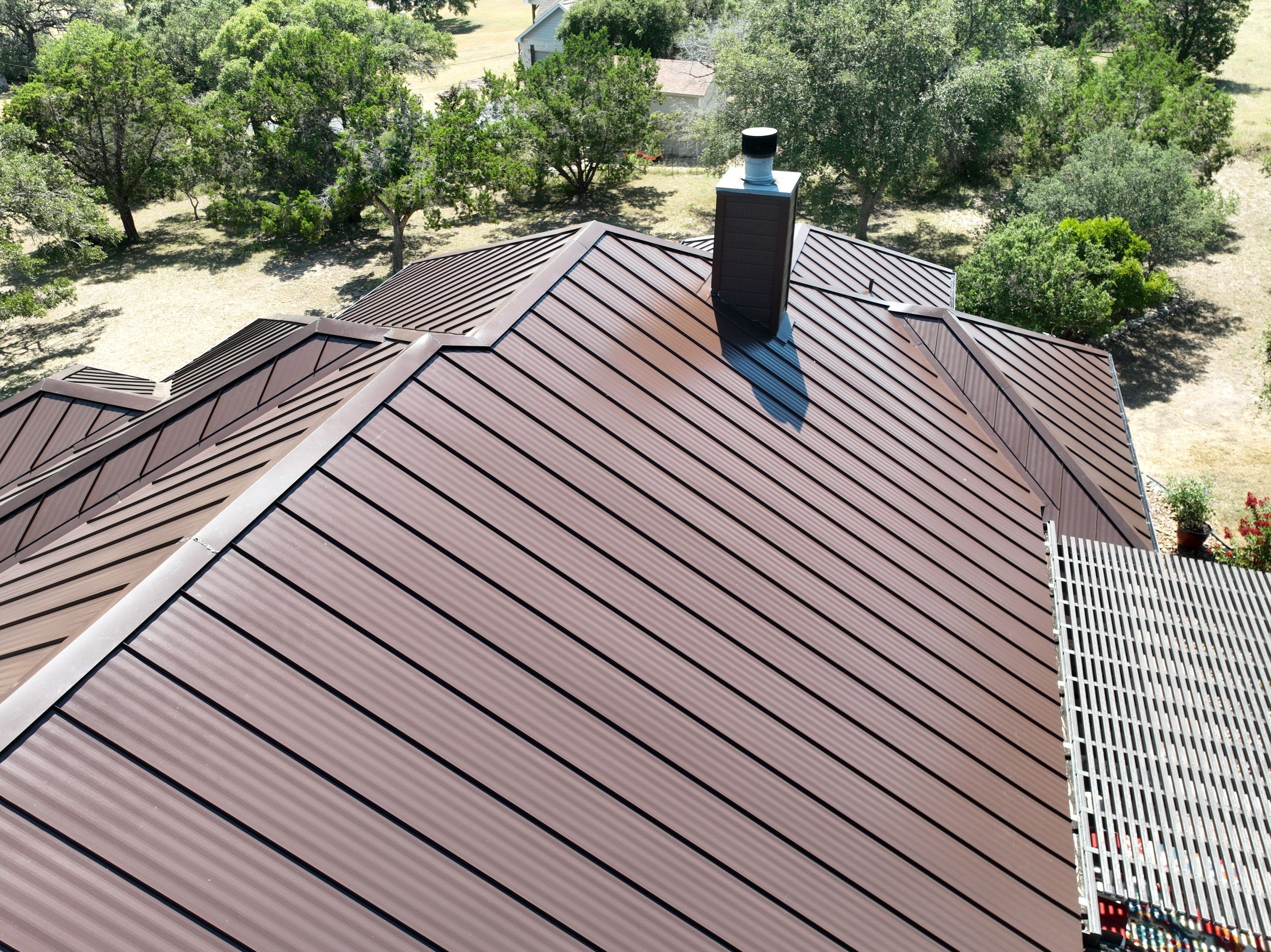 Residential Metal Roof Installation using McElroy Metal by Premier Roofing and Contracting