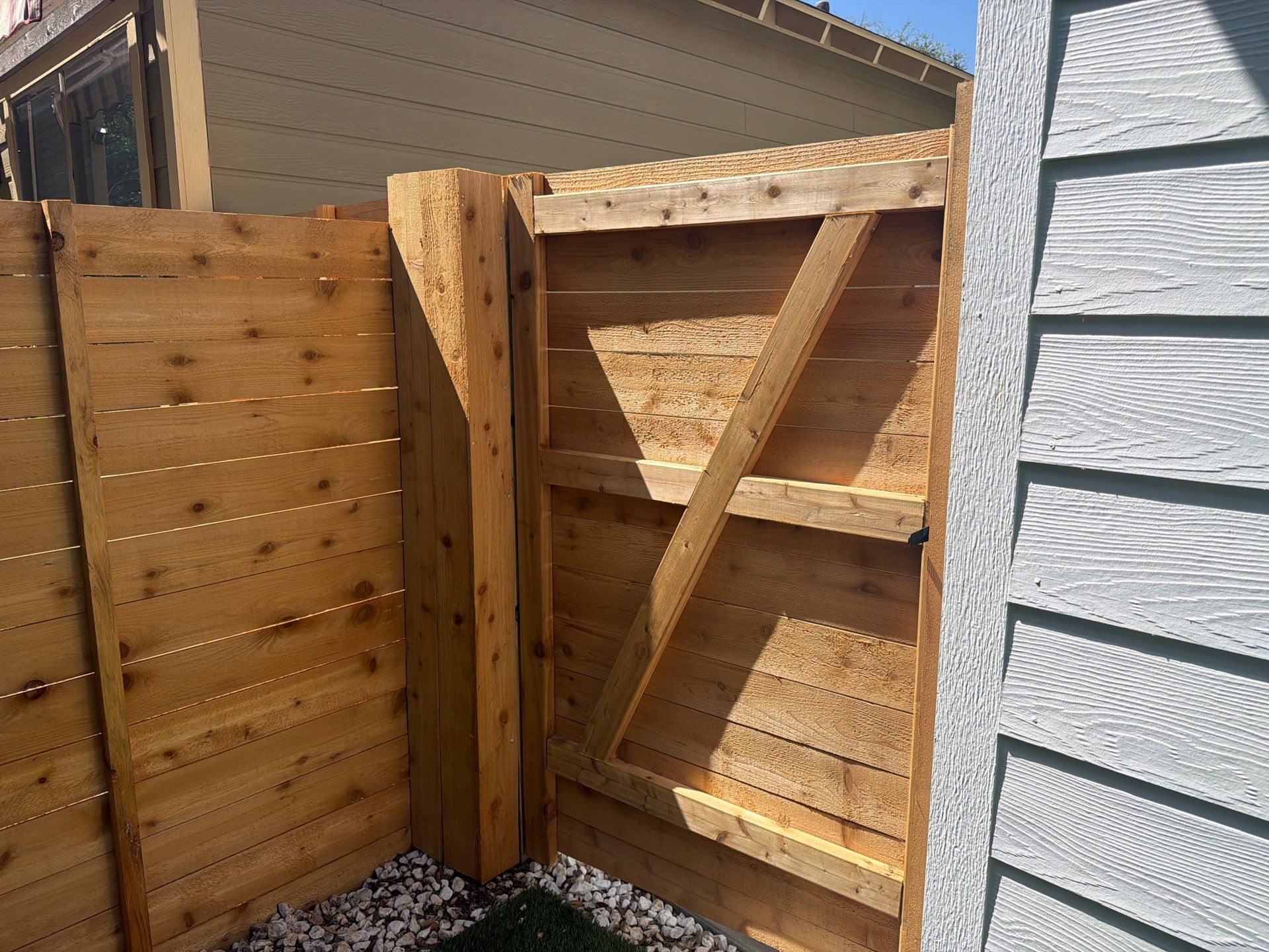 Custom Horizontal Cedar Privacy Fence and Gate Installation in Austin by Rhino Home Care