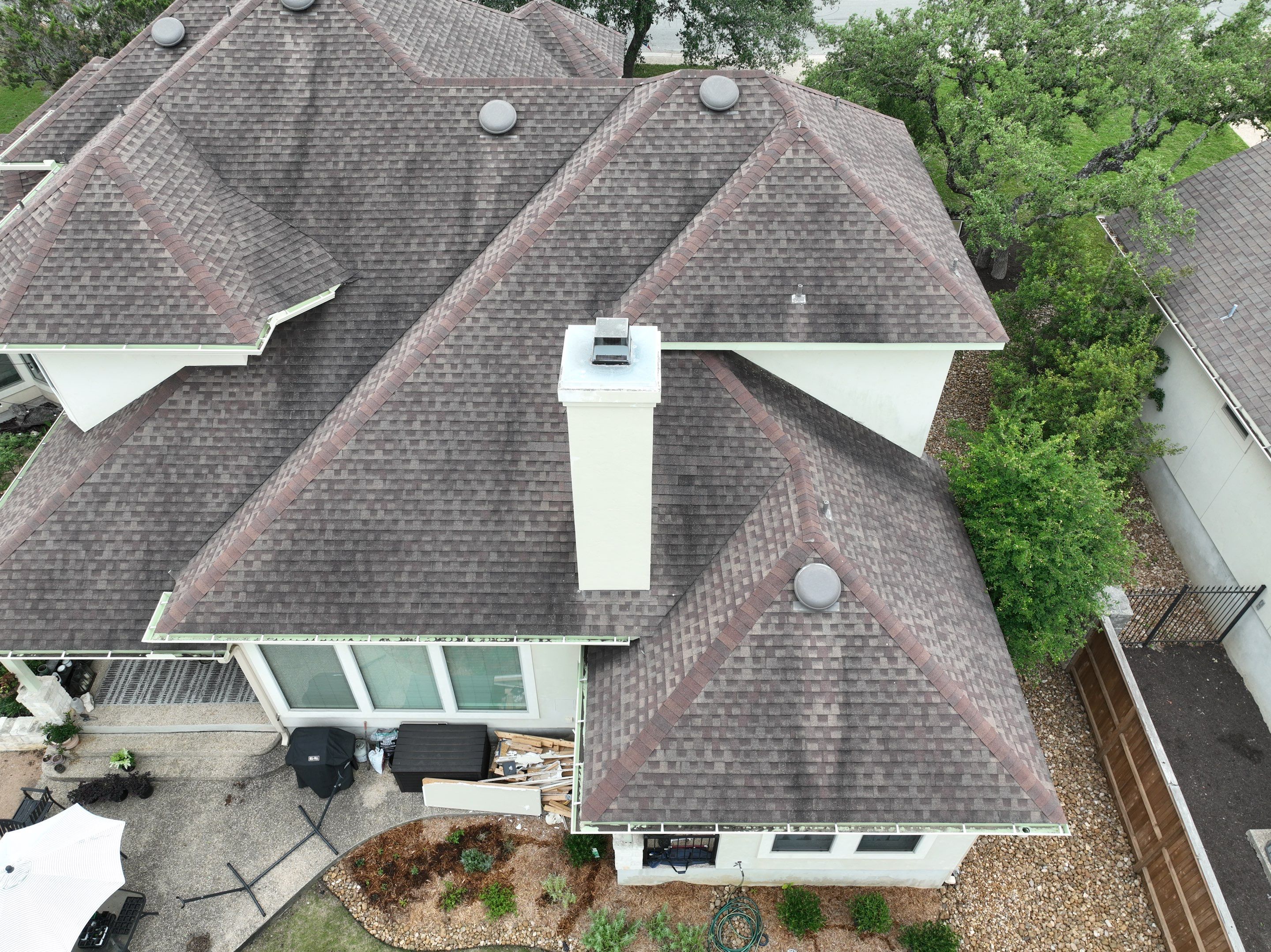 Residential Roof Replacement using 30 Year Laminate Shingles with High Profile Ridge by Premier Roofing and Contracting
