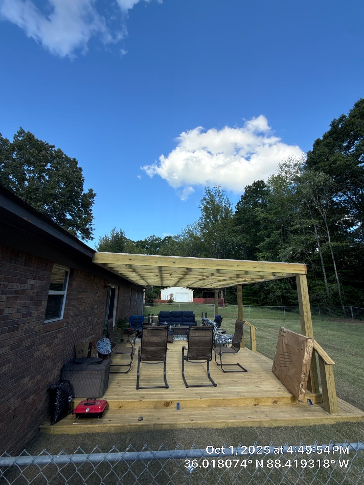 Front Entry Enhancements and a Back Deck Upgrade by Elite Proscapes LLC