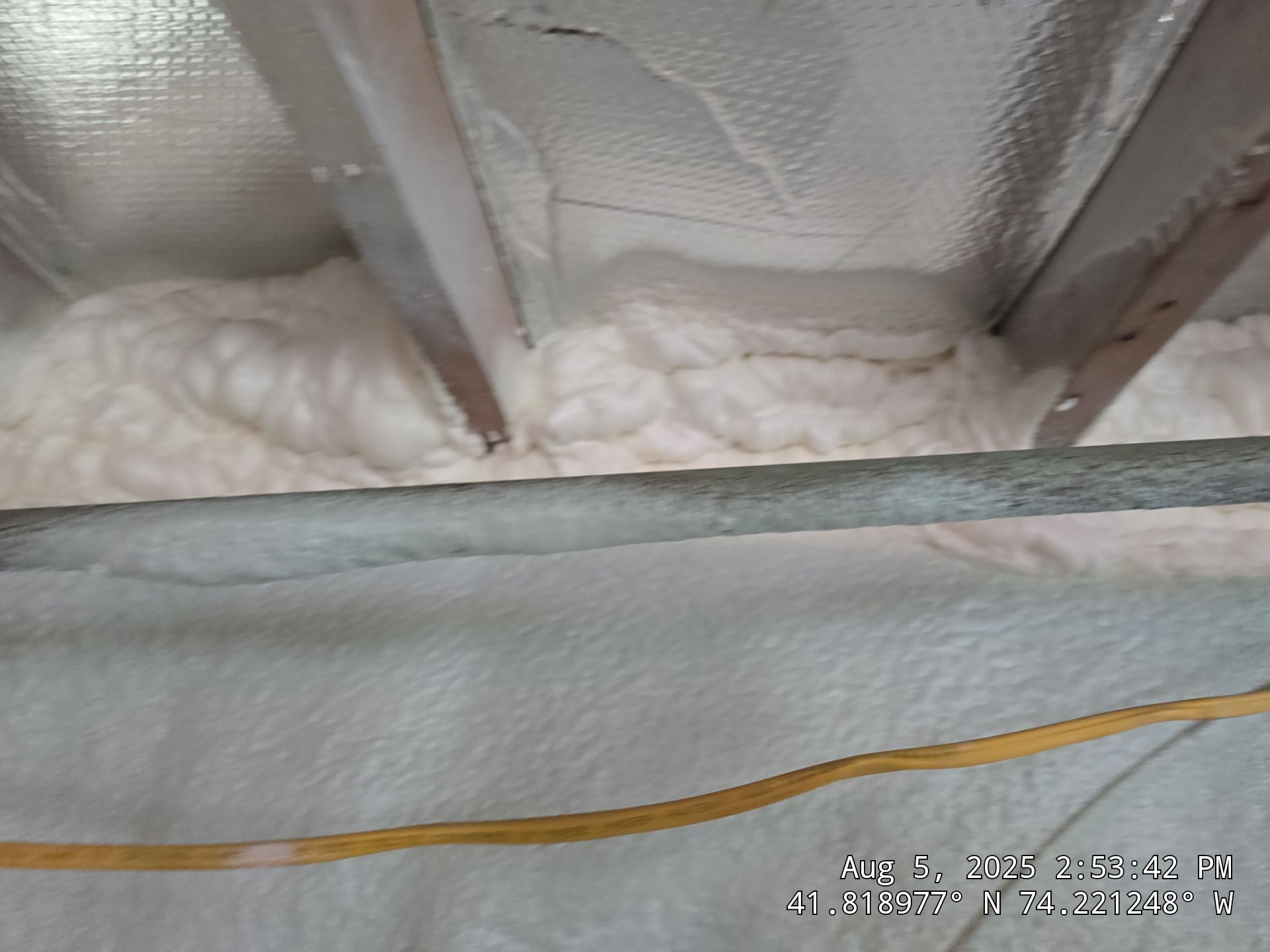 Master bedroom Exterior Walls using open cell spray foam by NYS Foam & Energy