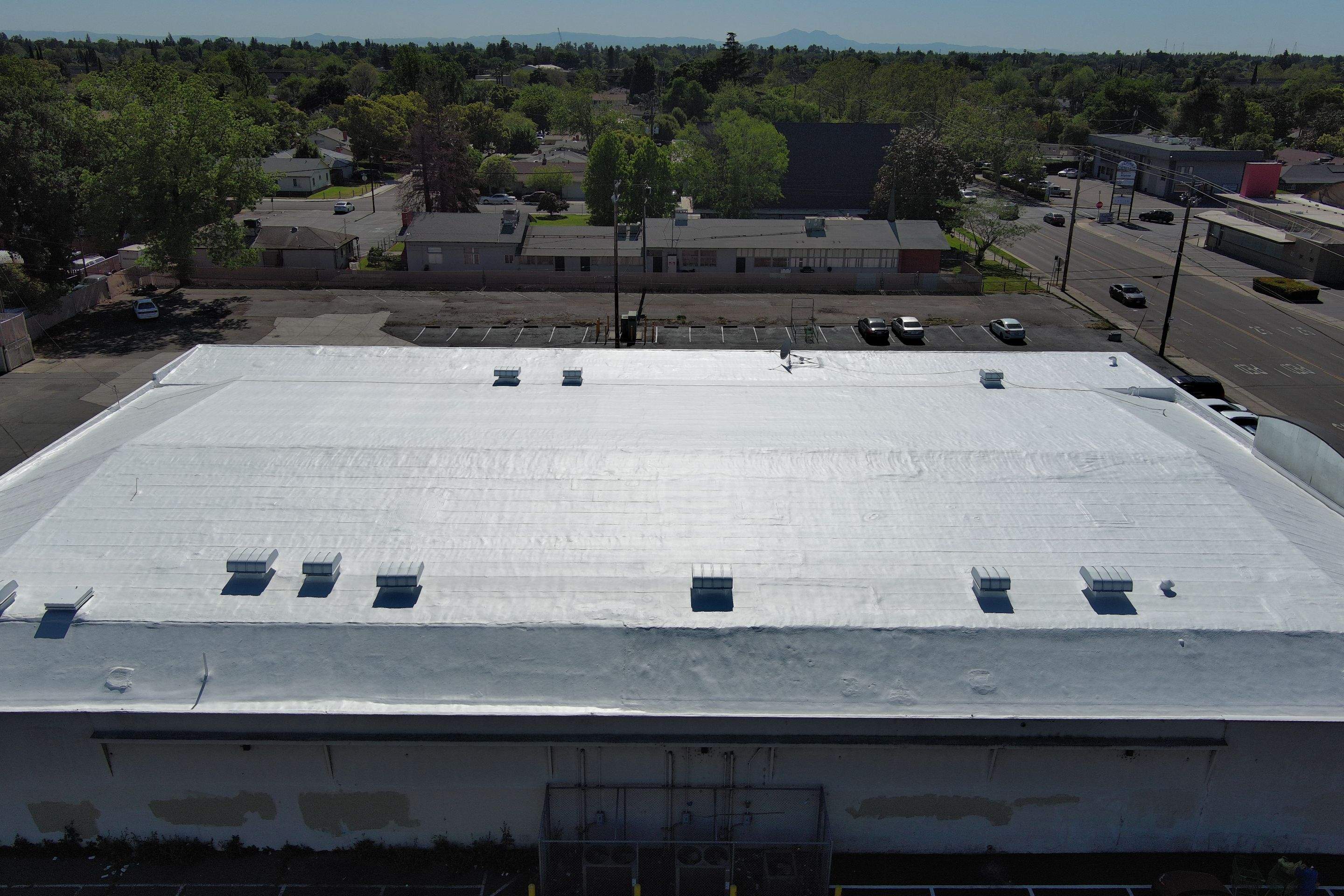 Foam Refurbish using Conklin Benchmark/PUMA XL coatings and spray foam by Straight Edge Roofing Inc