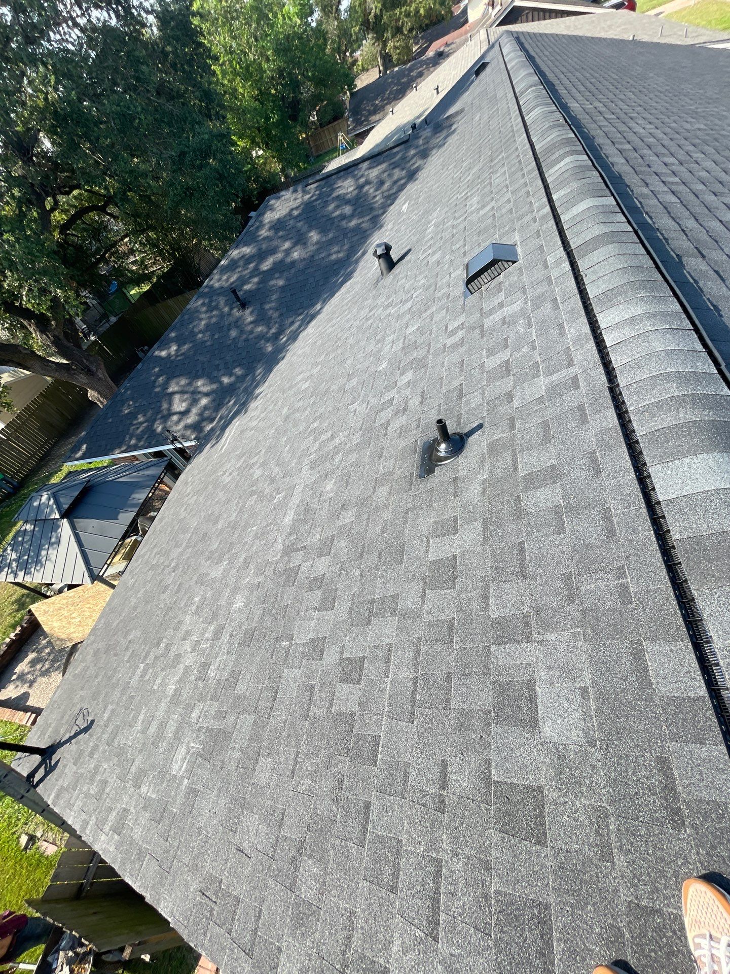 Residential Roofing Installation using Tamko Heritage® Series Rustic Black by CAP Roofing and Construction LLC