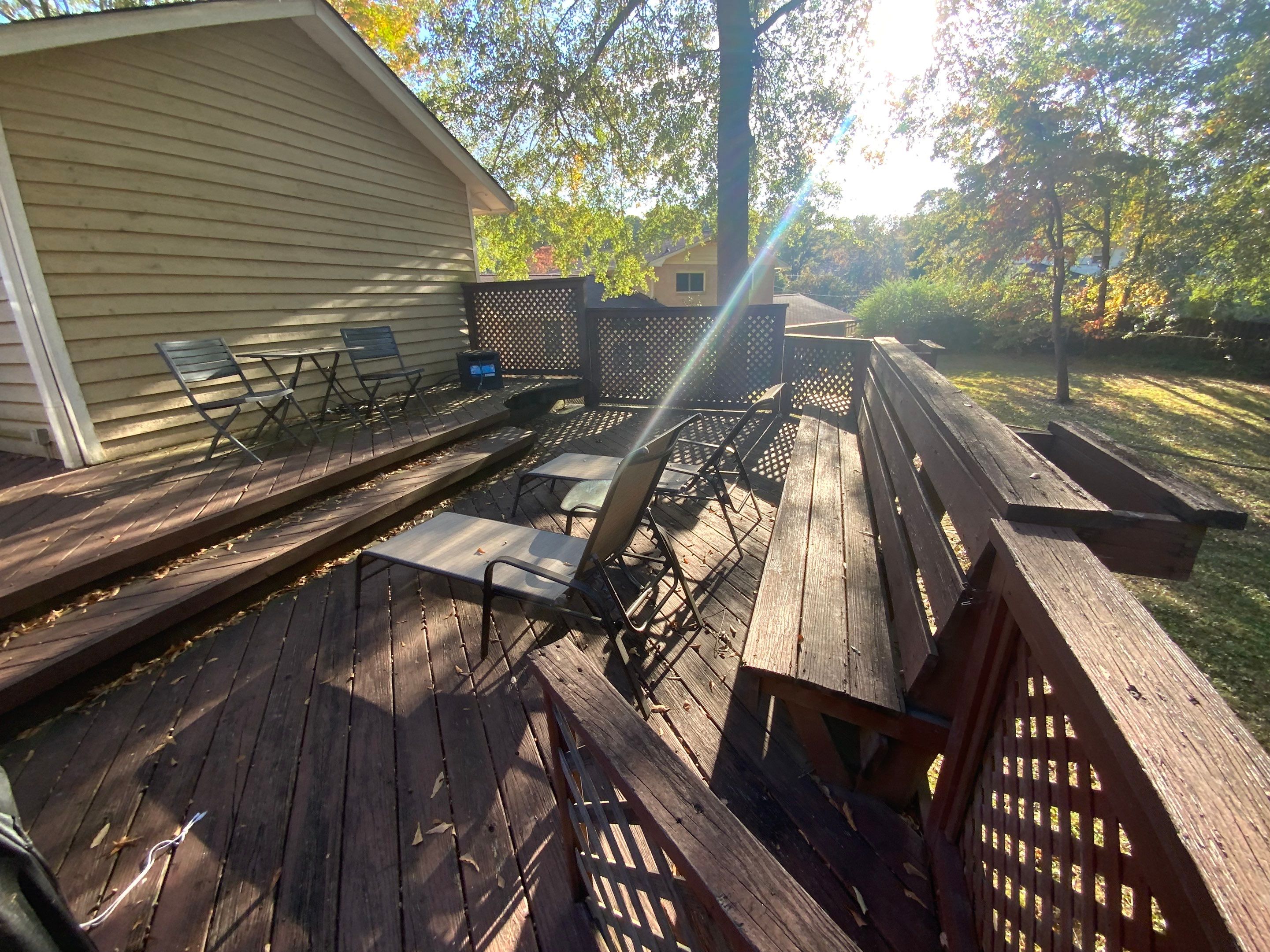 Elevated Pressure-Treated Wood Deck Extension in Marietta by Swift Home Renovations