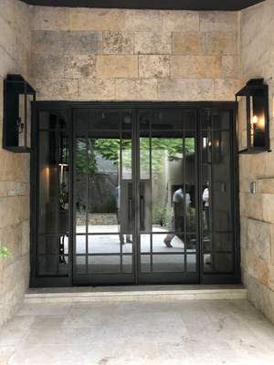 Custom Stone Entryway and Secure Perimeter Gate Installation in Monterrey