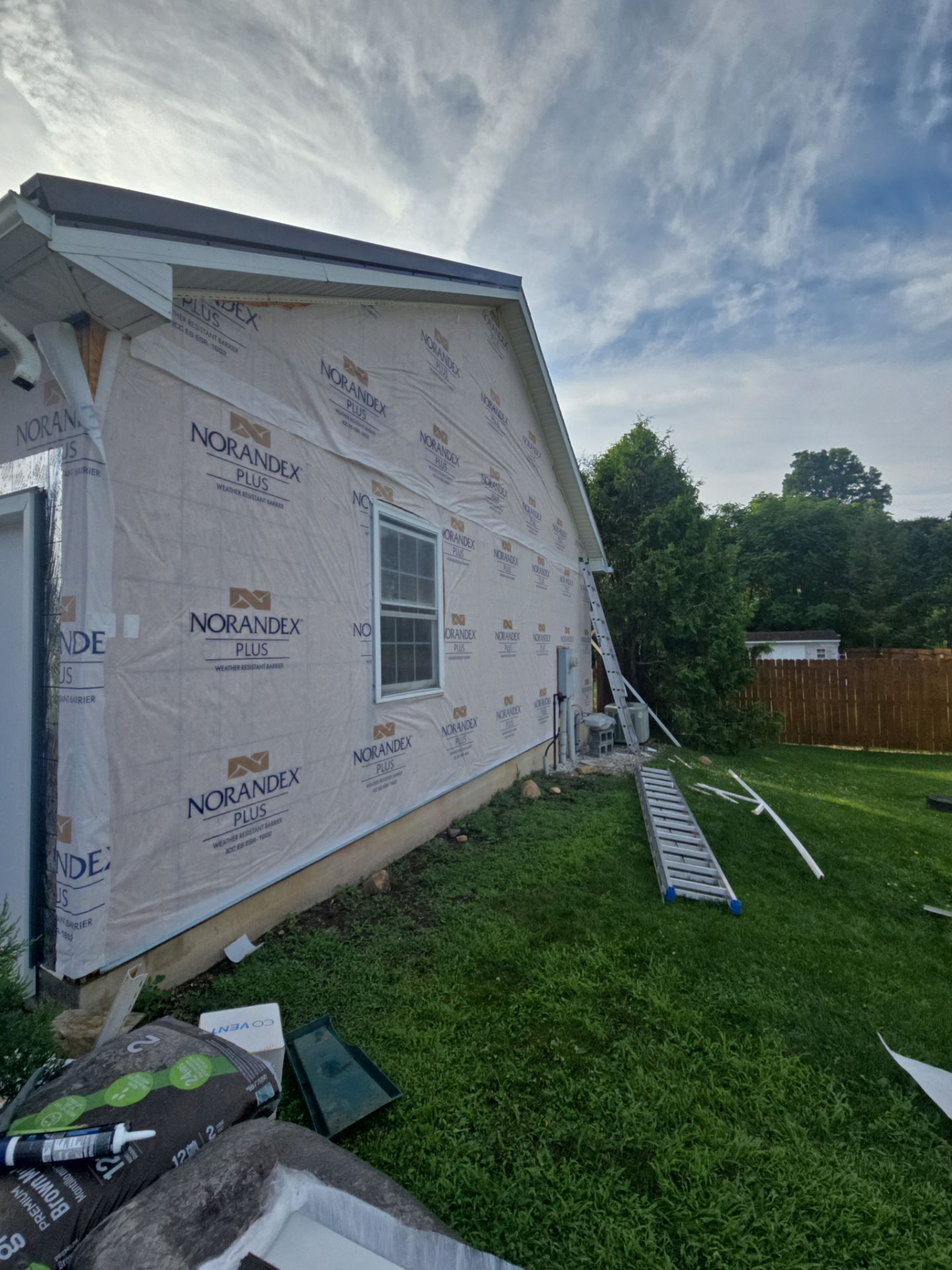 Elyse Goodman Siding and metal Installation  by Good Hands Roofing