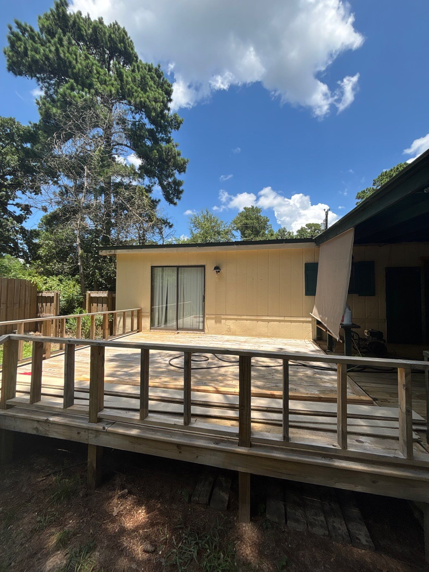 Full Exterior Revamp with Fence Staining in Flint, Texas by Quality Coats Painting