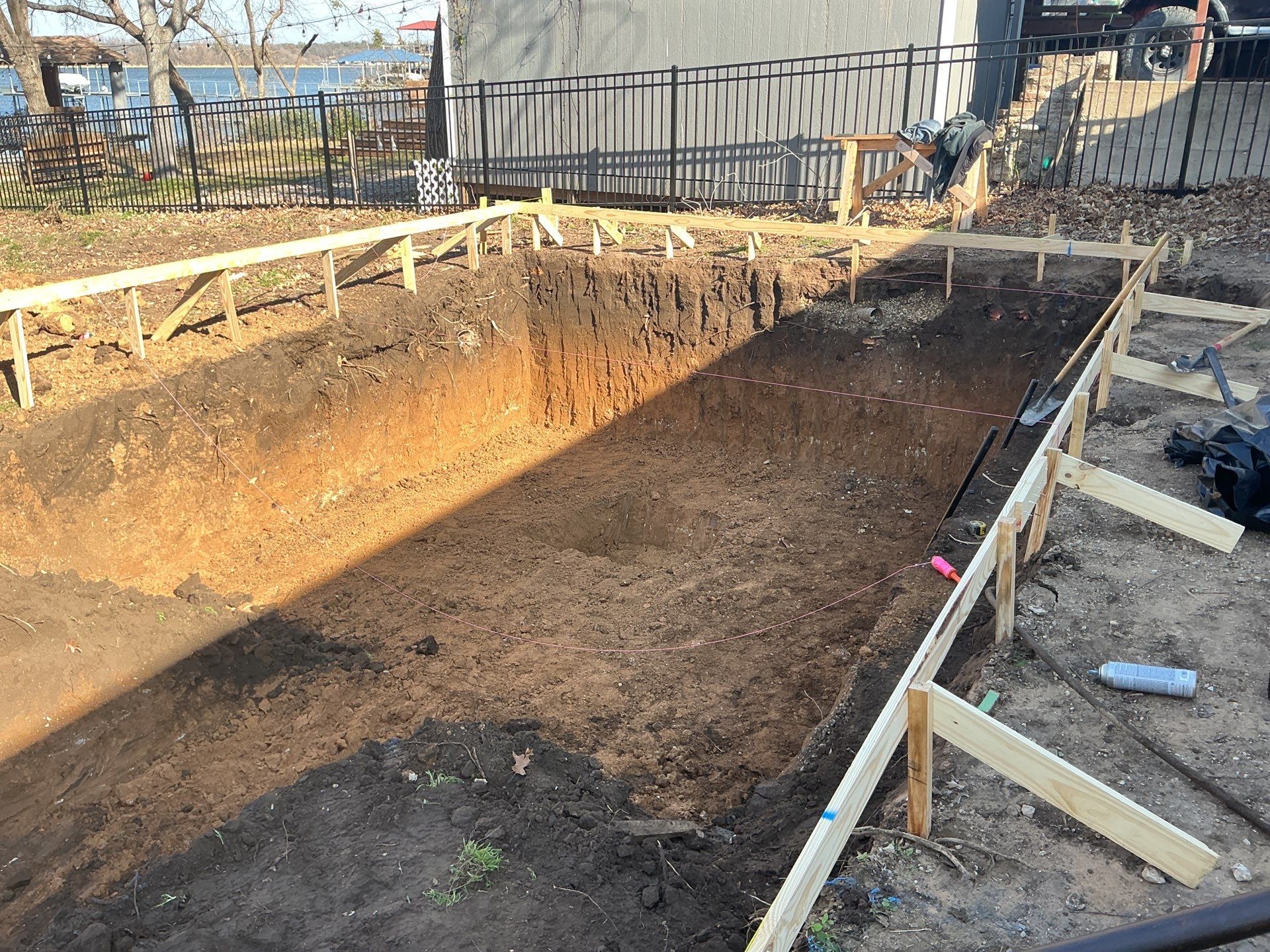 Lakefront Geometric Pool with Tanning Ledge by Pinnacle Pools and Spas - DFW