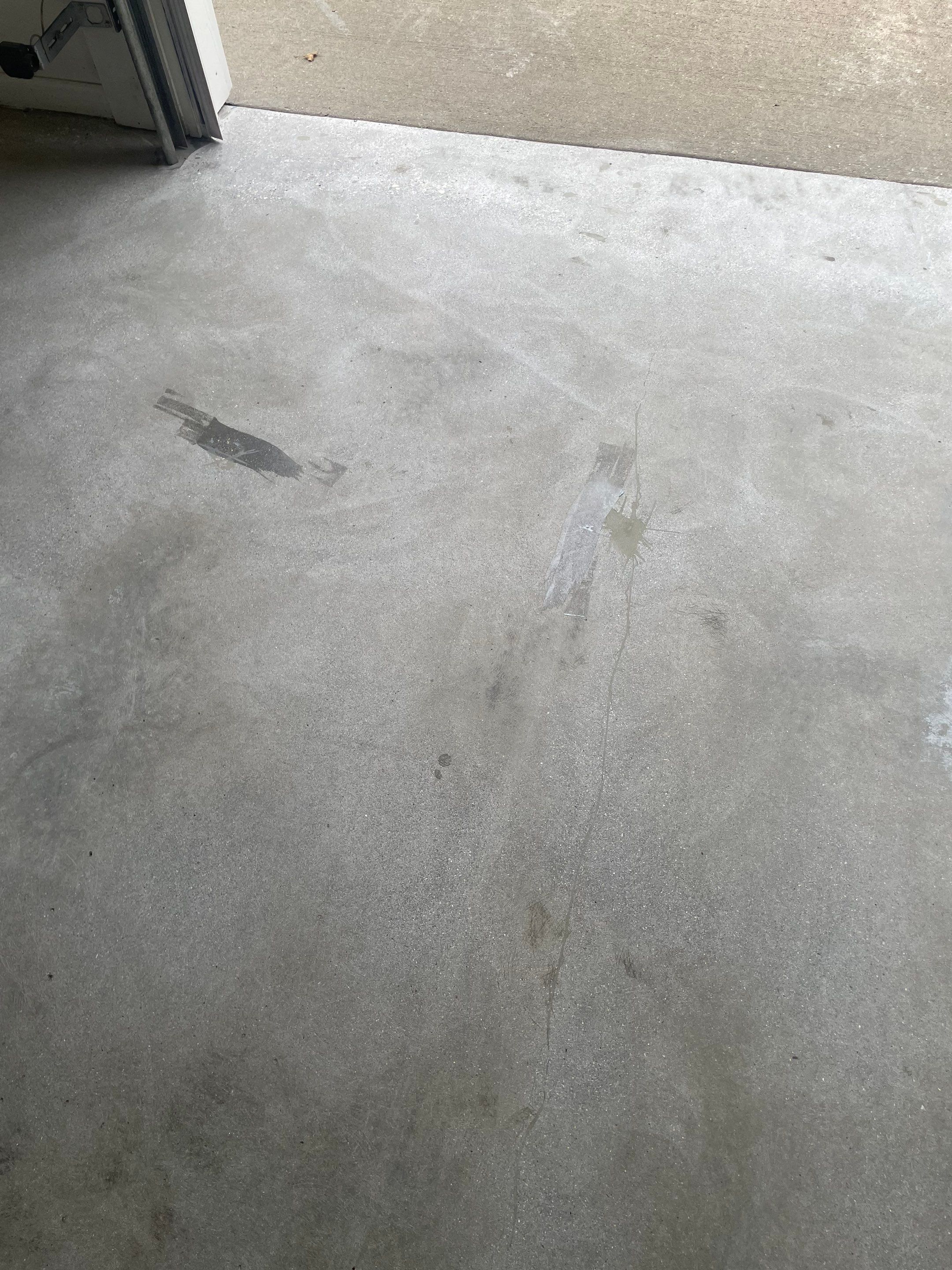 Coyote Flake Garage Floor Coating in Worthington, Minnesota by Select Painting, Coatings & Garage Cabinets