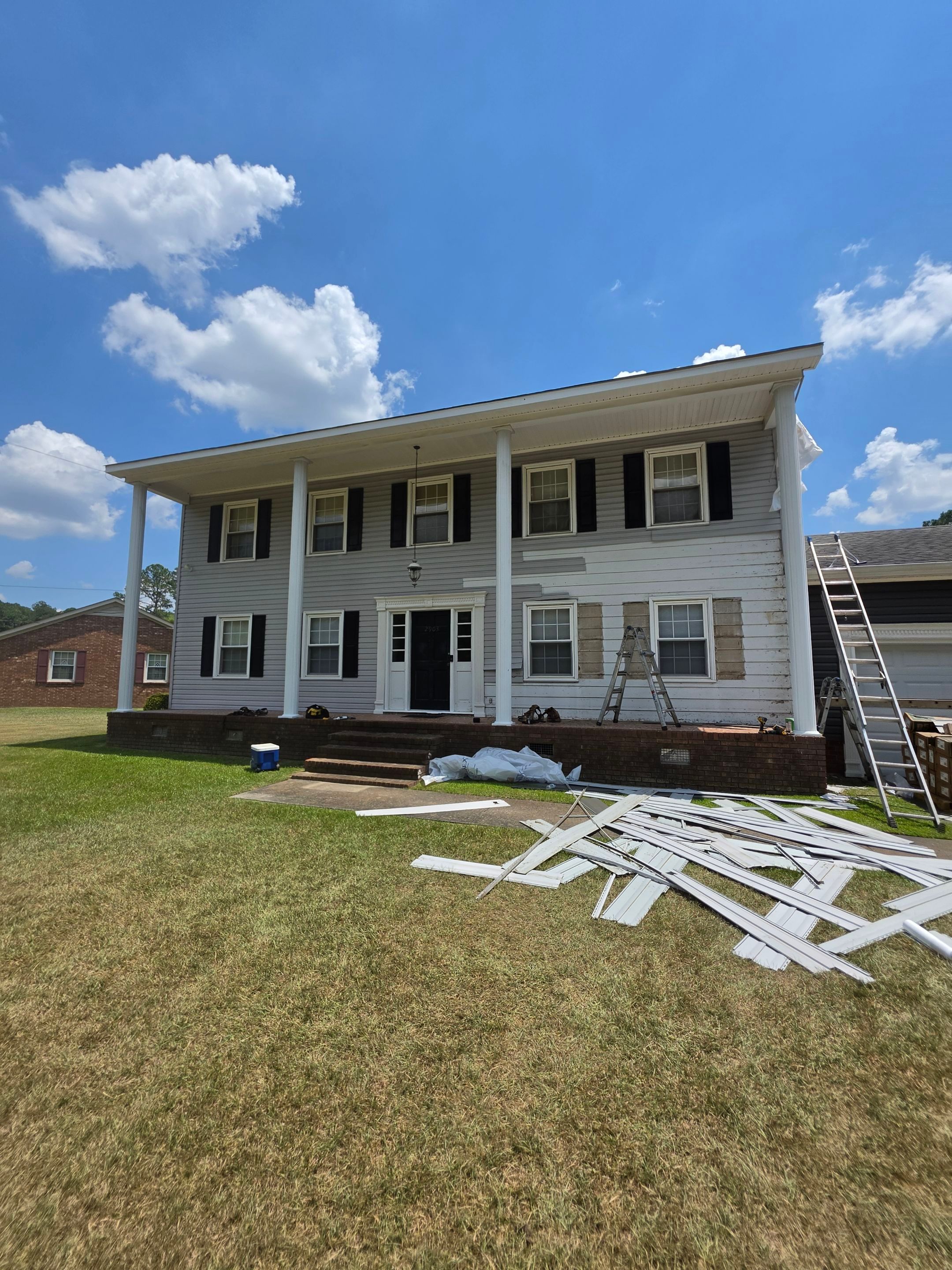 Dark Gray Siding and Custom Deck Installation in Kinston by The Remodeling Company