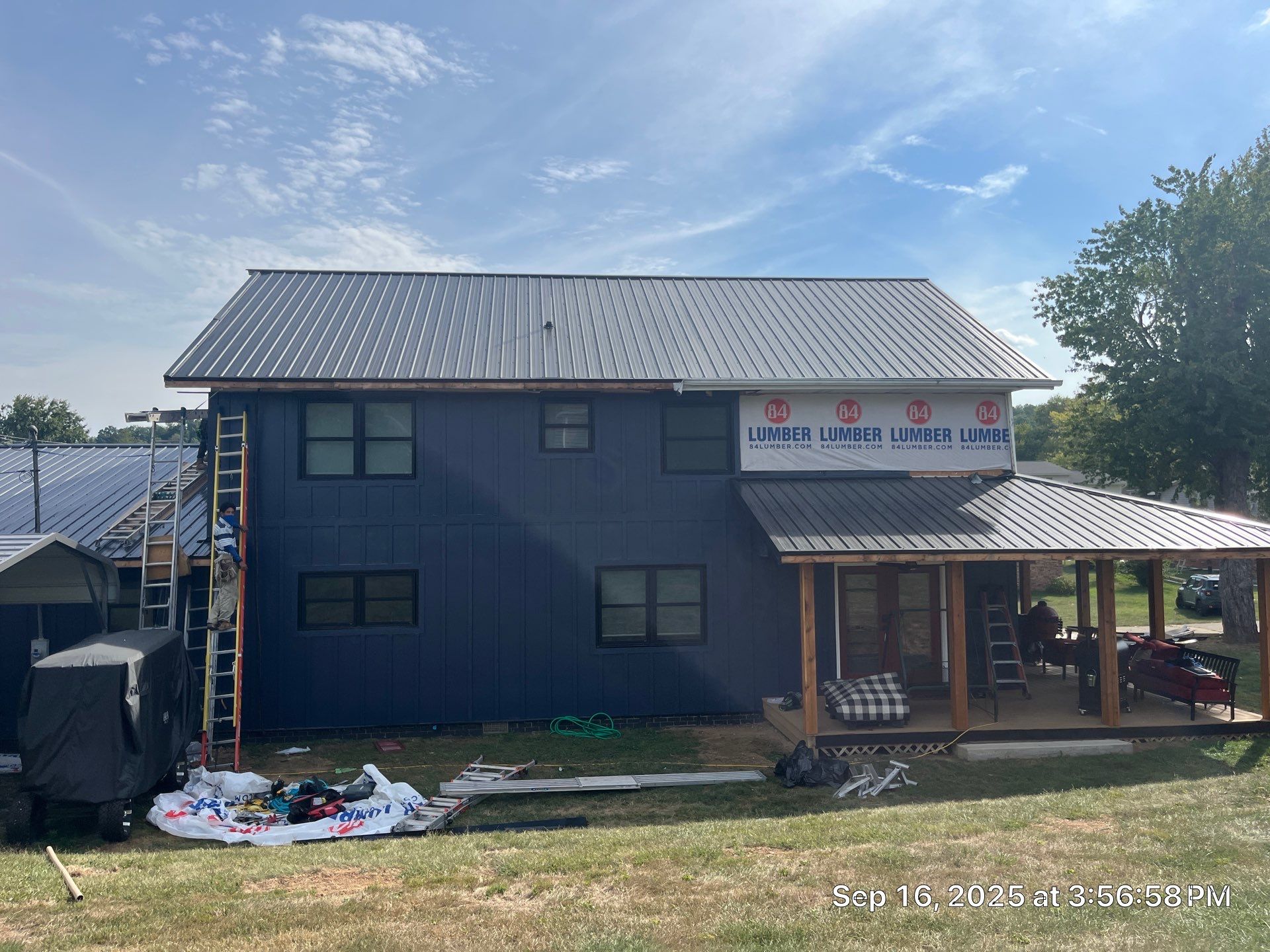 Siding and Metal Roof by Fahey Roofing + Contracting