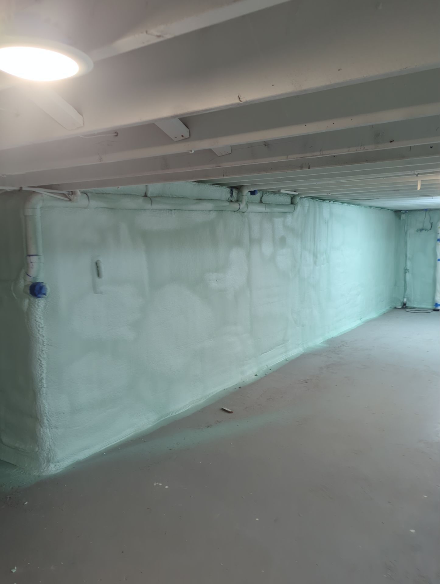 Basement Exterior Walls using Closed Cell Spray Foam by NYS Foam & Energy