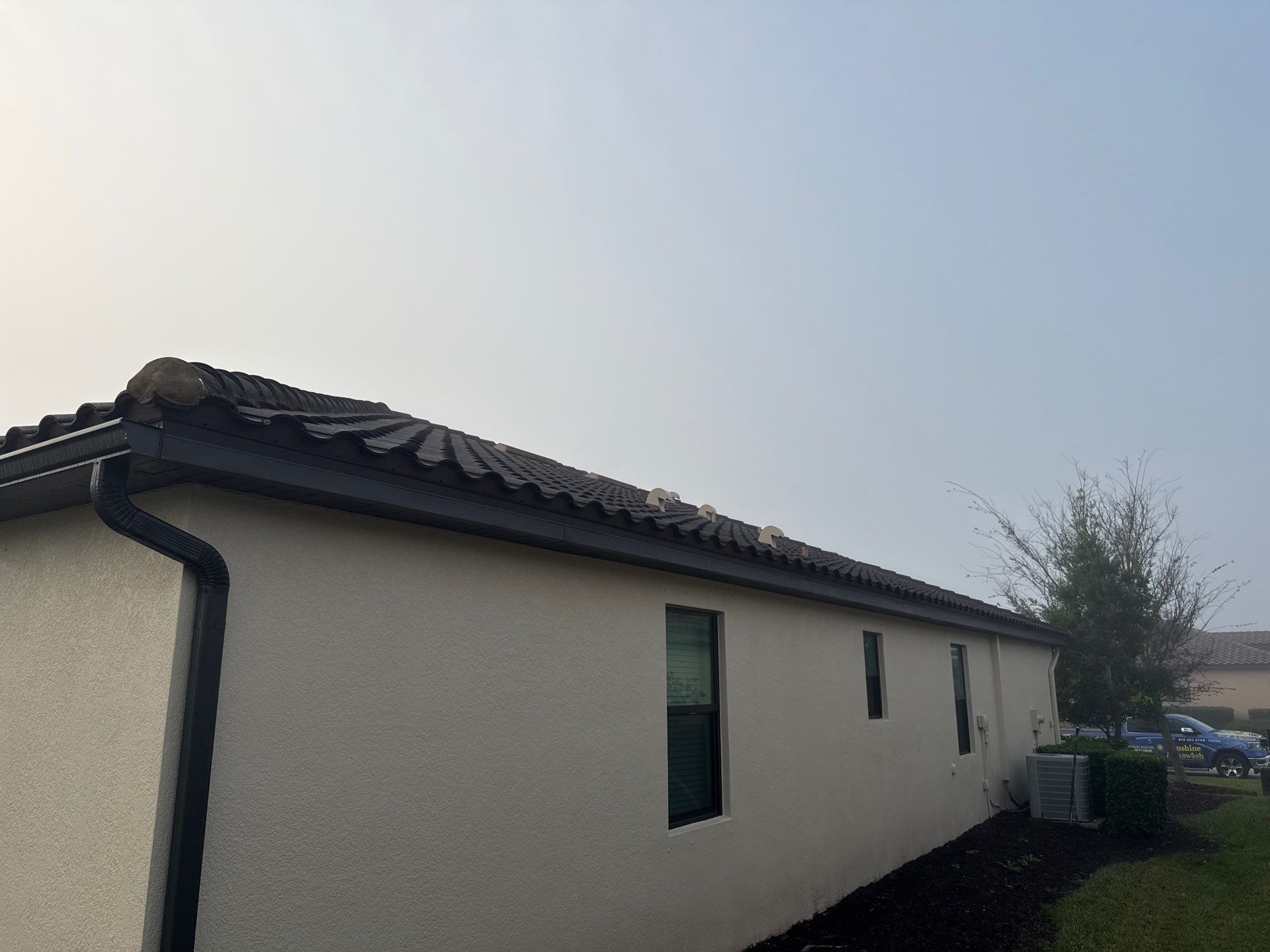 Barrel Tile Roof Cleaning & Paver Driveway Cleaning in River Strand at Heritage Harbour | Bradenton, FL by Sunshine AquaWash