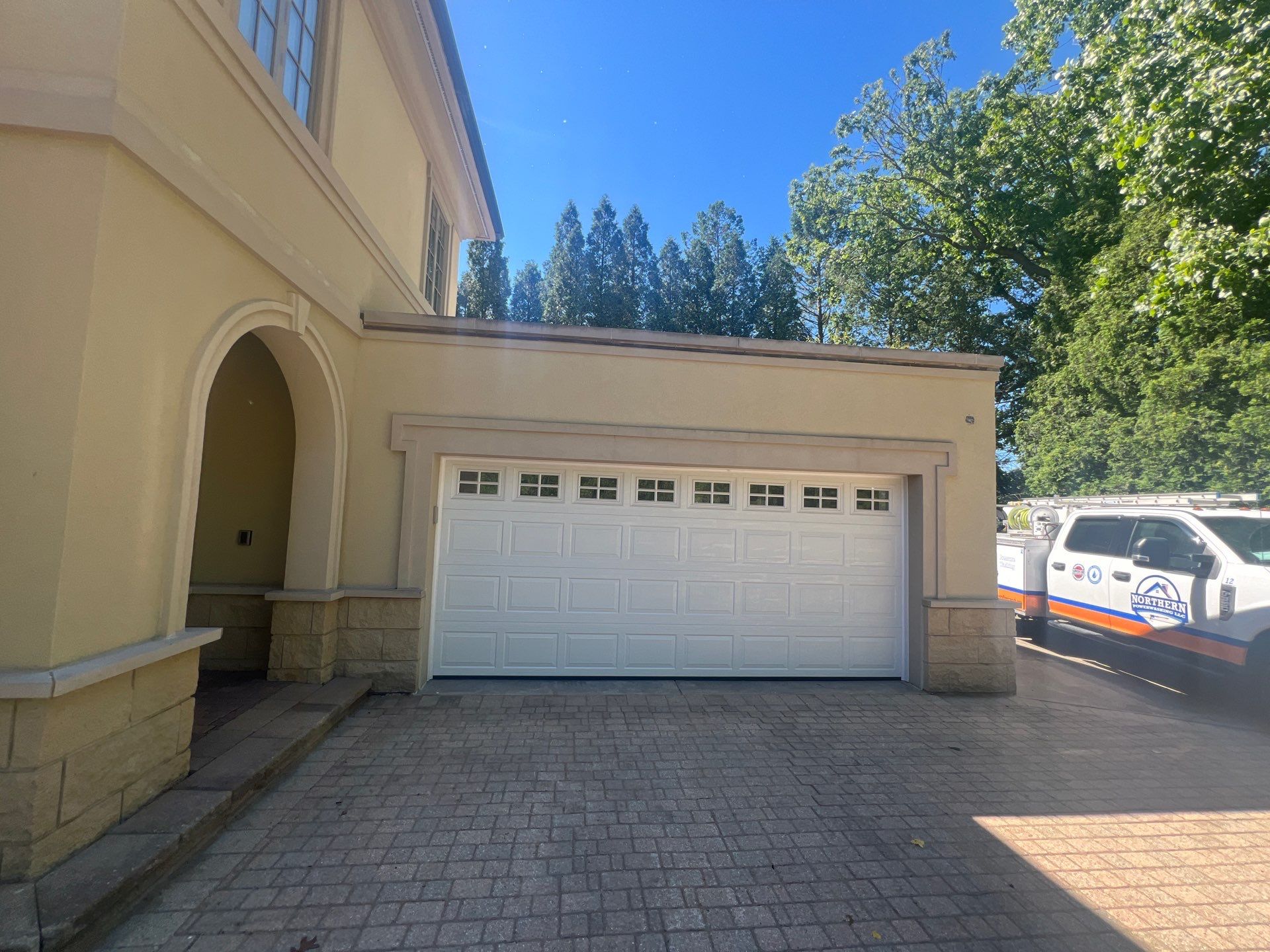 concrete cleaning using Algaecide, soft wash soap by Northern Power Washing LLC.