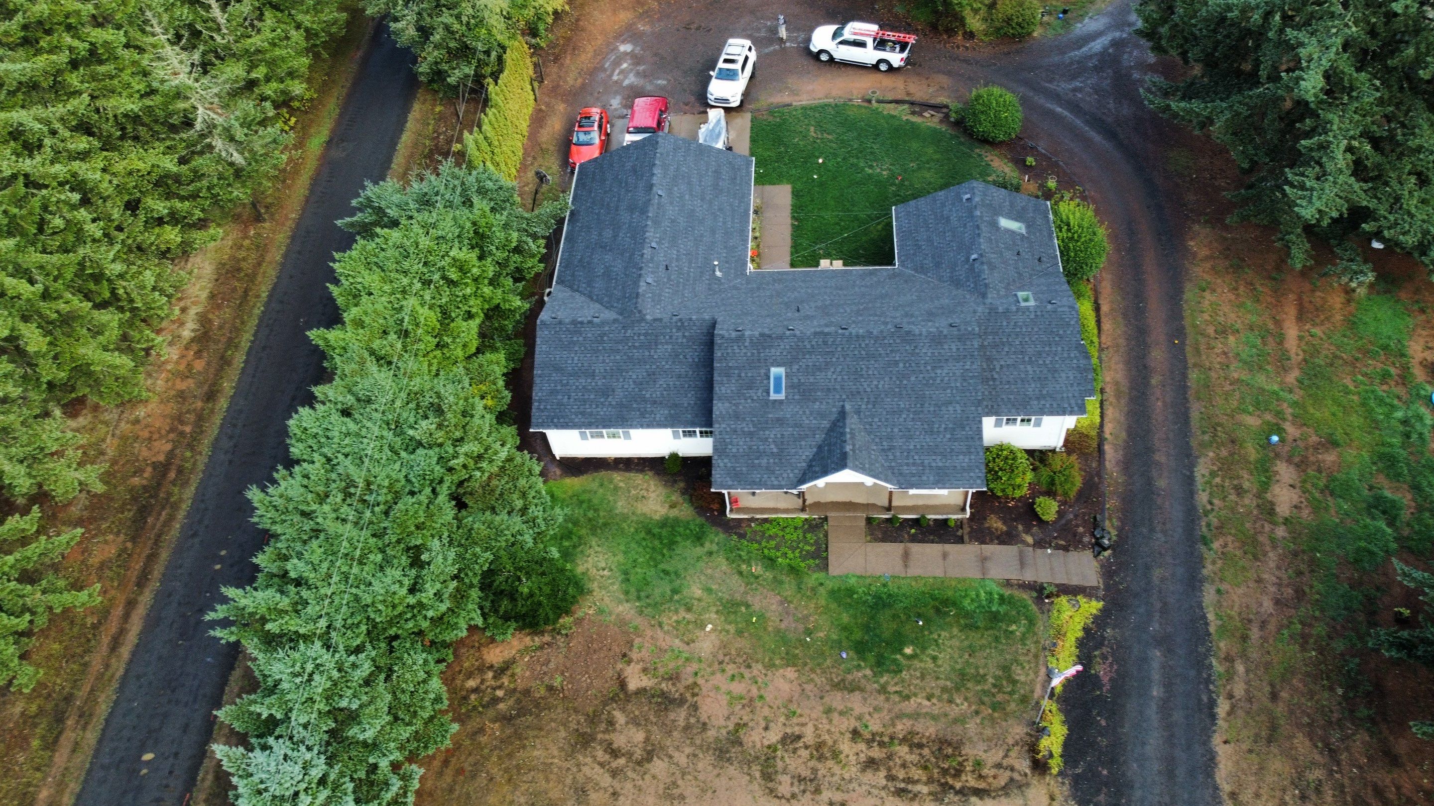 Residential Roofing Installation using IKO Dynasty (Color: Granite Black) by Orezona Building & Roofing Company, Inc.