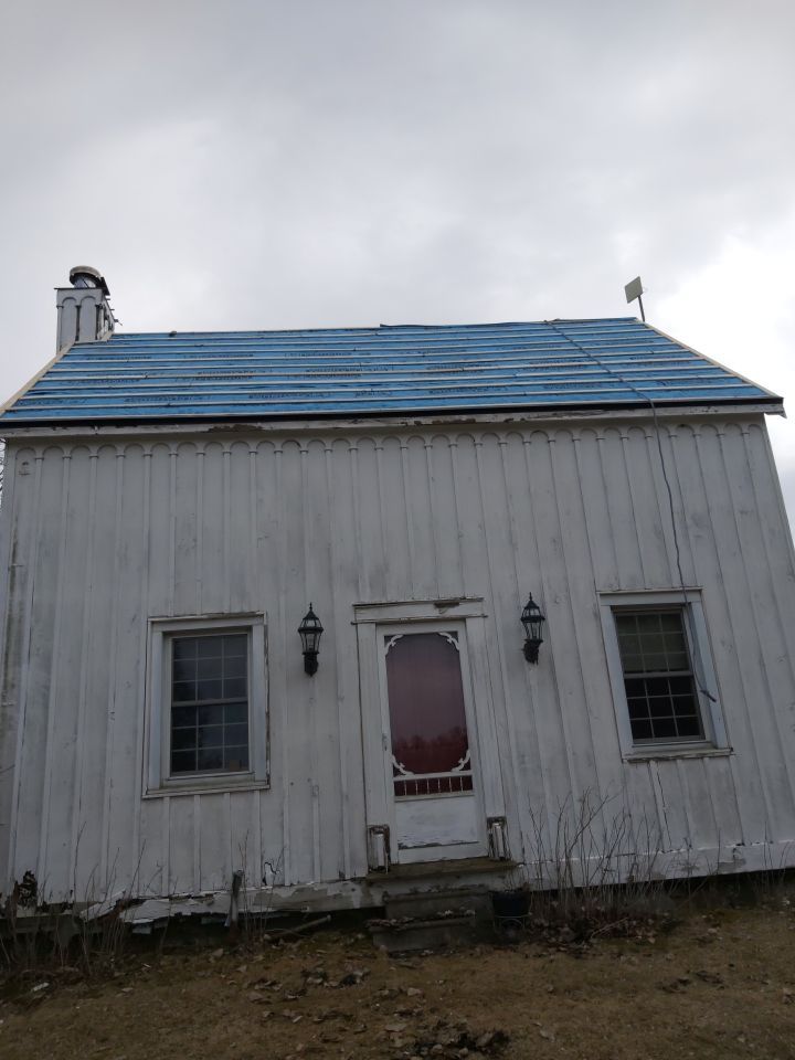 Residential Roofing Installation using 16" Standing Seam Panels by Jay Carter Roofing & Sheet Metal