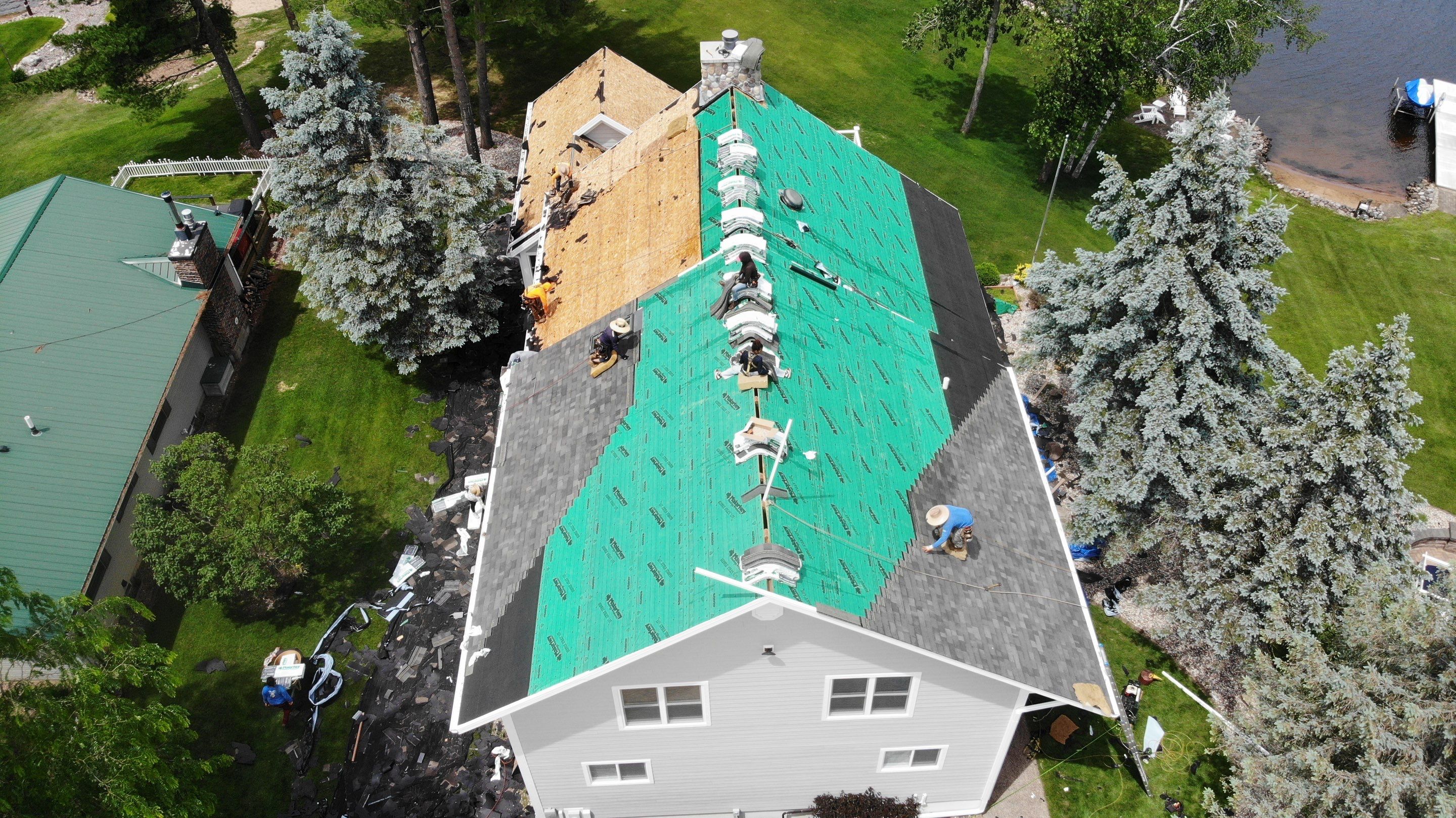 Nekoosa Residential Roof Replacement with Architectural Shingles and Skylights by Mr Roof & Remodeling Co