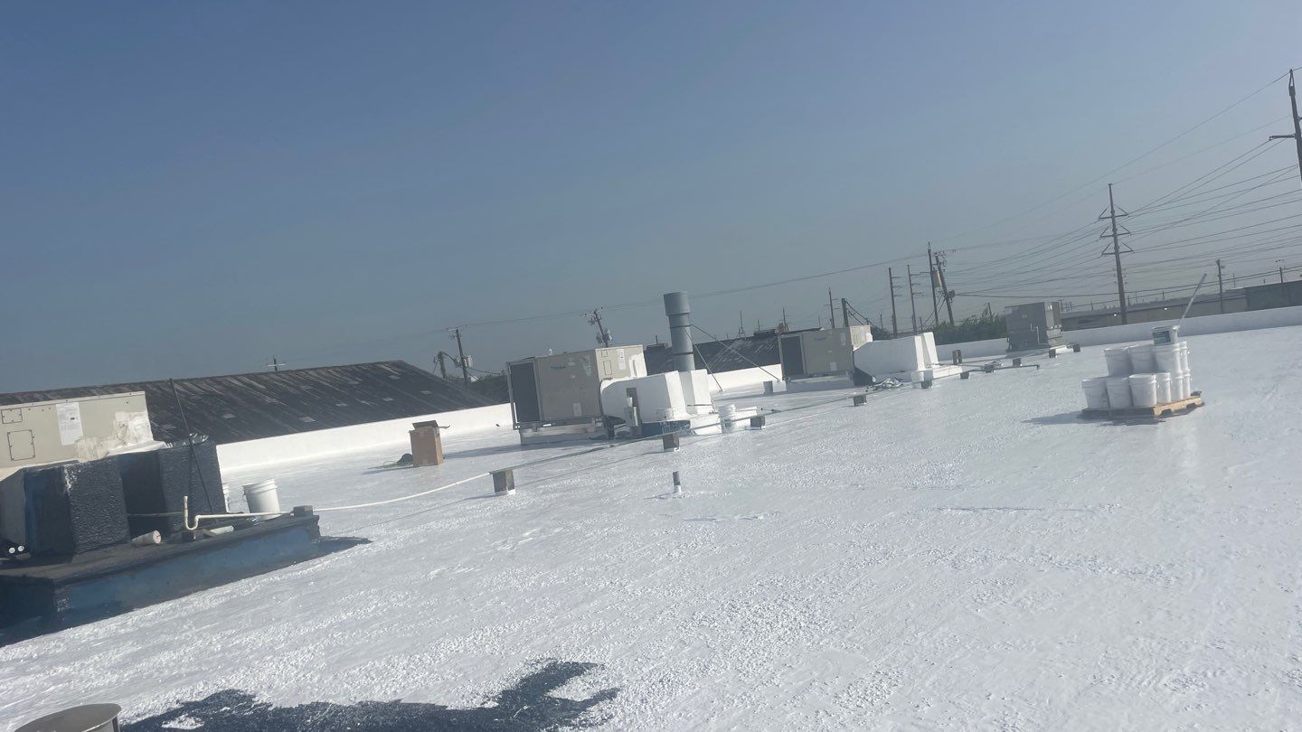 Dirty leaking Gravel Roof by Bayfront Roofing and Construction