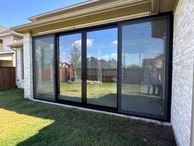 Year-Round Bonus Room: Patio Enclosure Featuring 16ft Seamless Sliding Glass