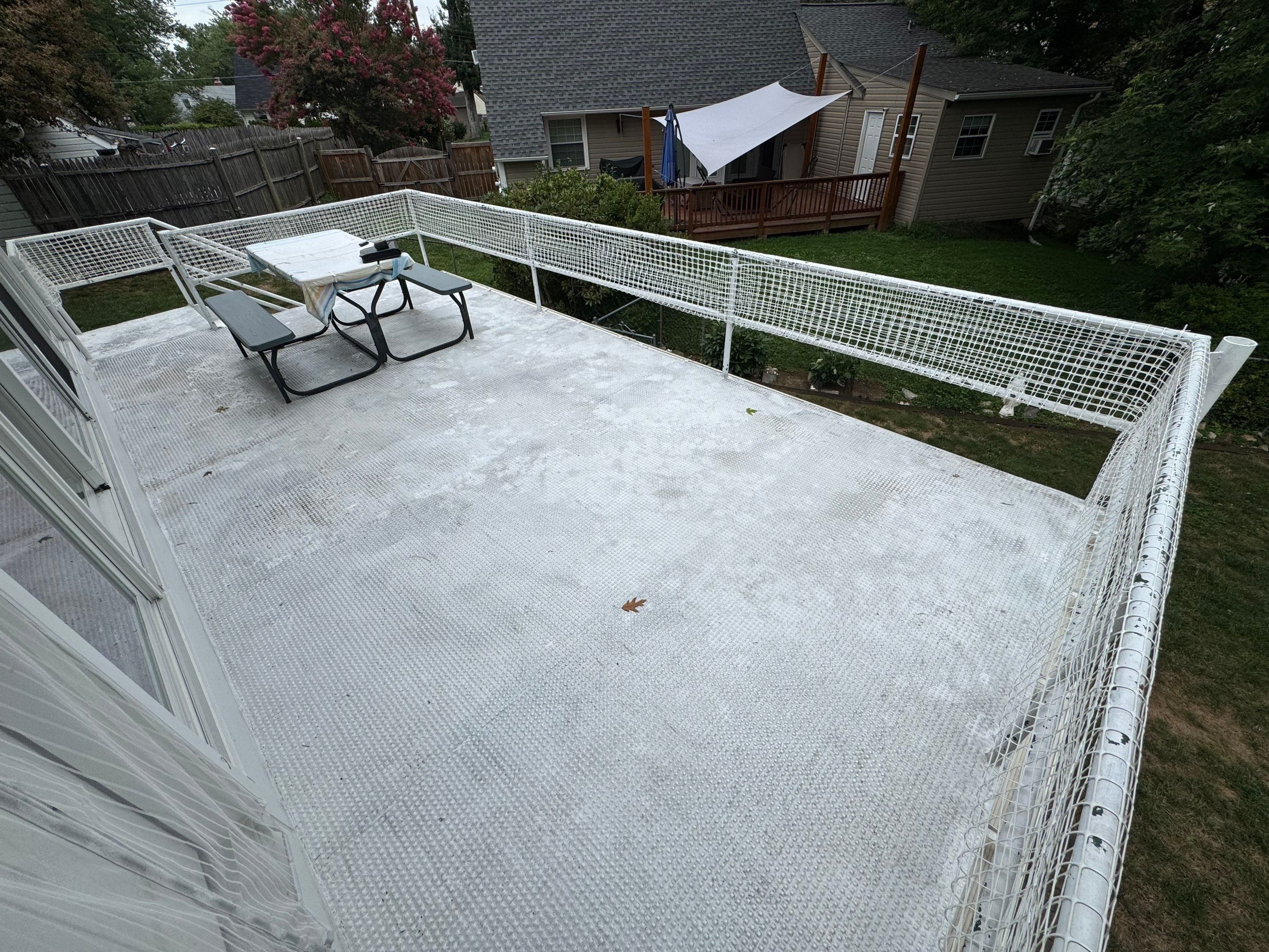 White Powder-Coated Outdoor Railings in Rockville & Staircase and Deck Refurbishment  by Capitol Iron Works