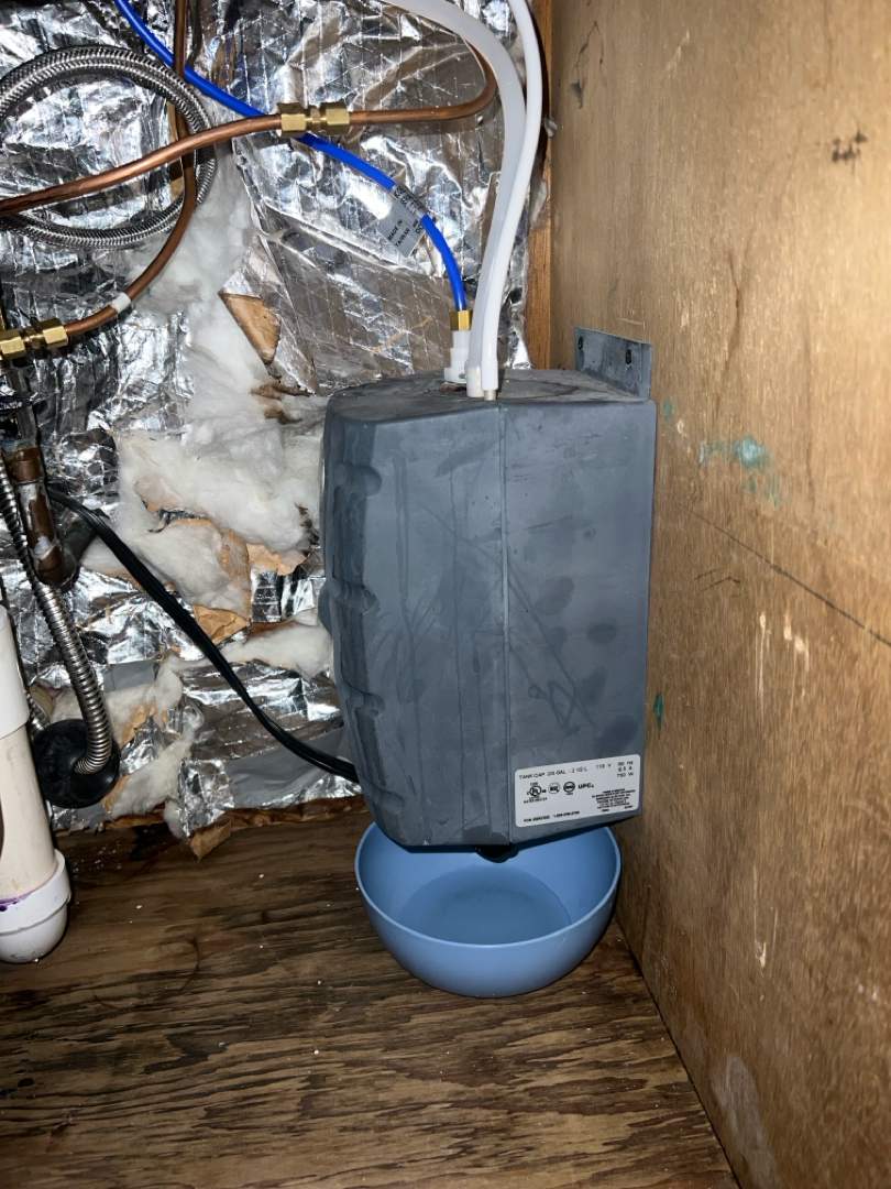 Leaking On-demand Water Heater Removed — Marblehead, MA by FAGONE MECHANICAL