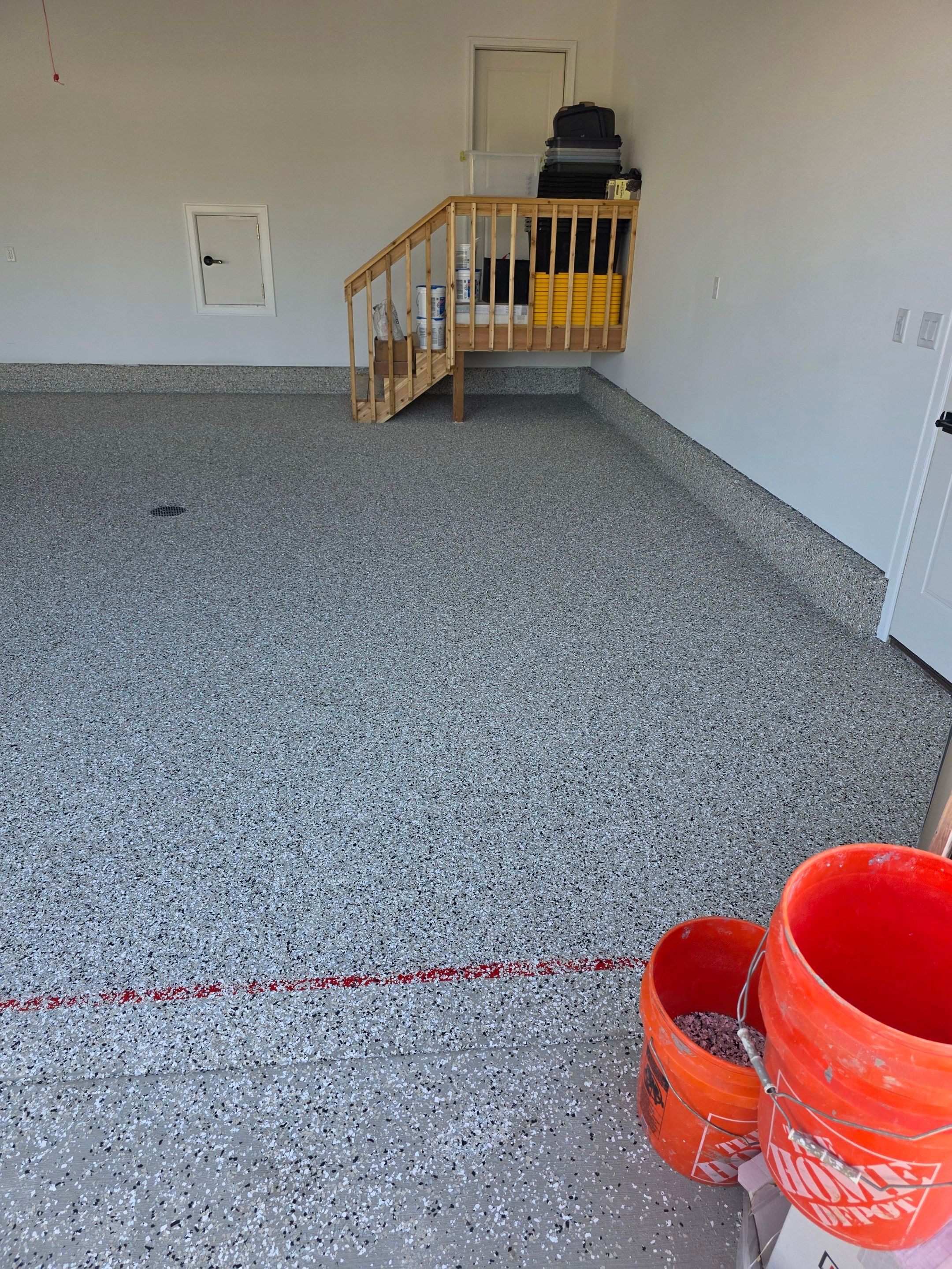 Gray and Black Speckled Polyurea Garage Floor in Dell Rapids by Select Painting, Coatings & Garage Cabinets