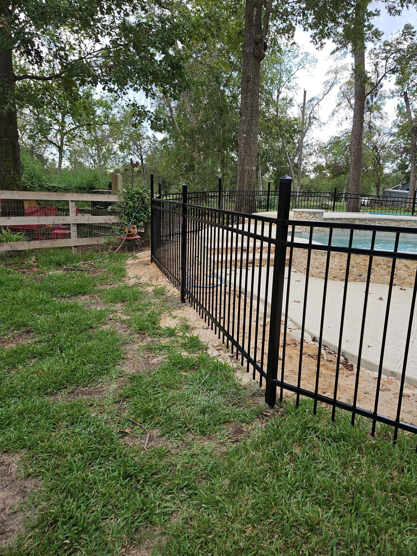 Ranch Style fence Plus Iron installation by Tim's Fences