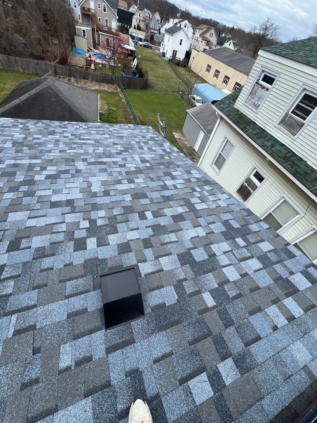 Atlantic Blue Shingles by Reimagine Roofing