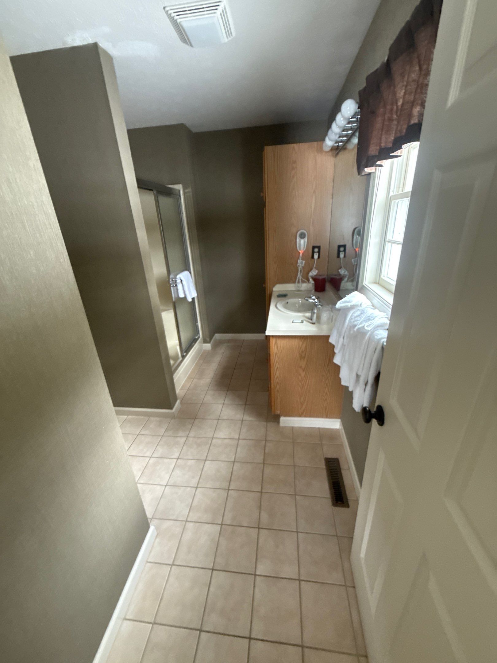 Bathroom and Powder Room Remodel by For Him Contracting
